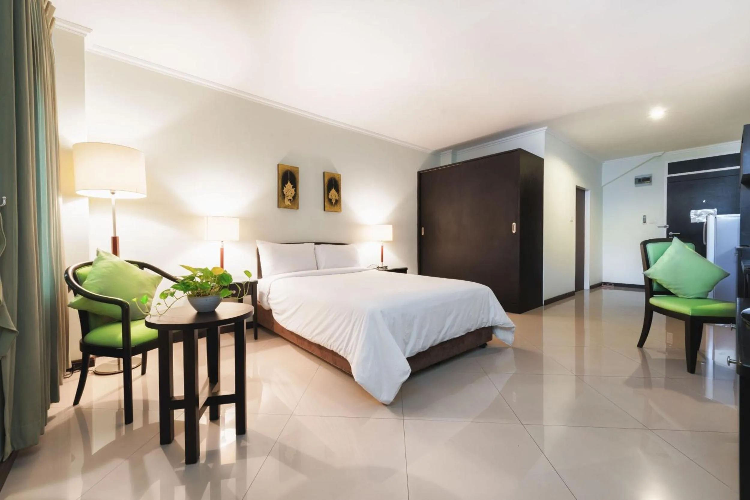 Photo of the whole room, Bed in Capital Mansion - SHA Certified