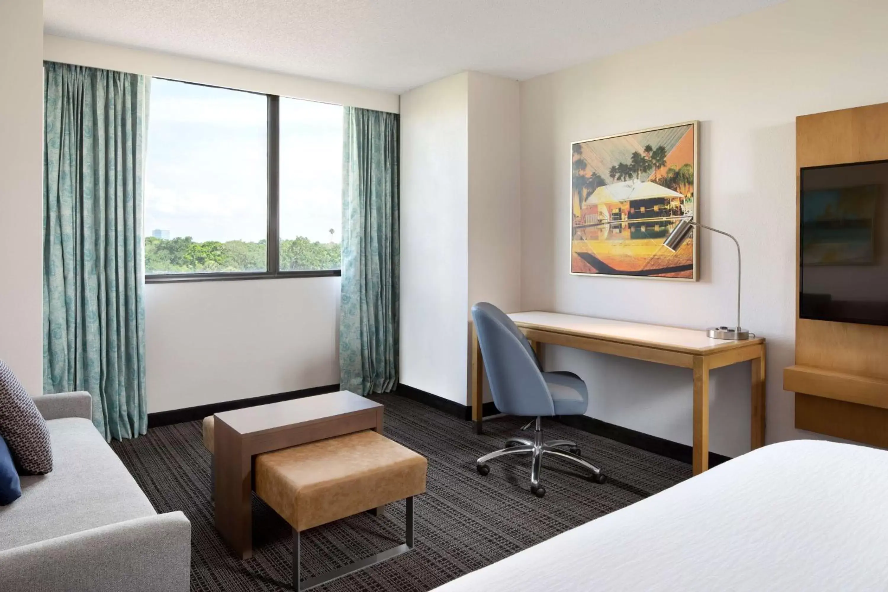 Bedroom, Seating Area in Embassy Suites by Hilton Tampa Airport Westshore