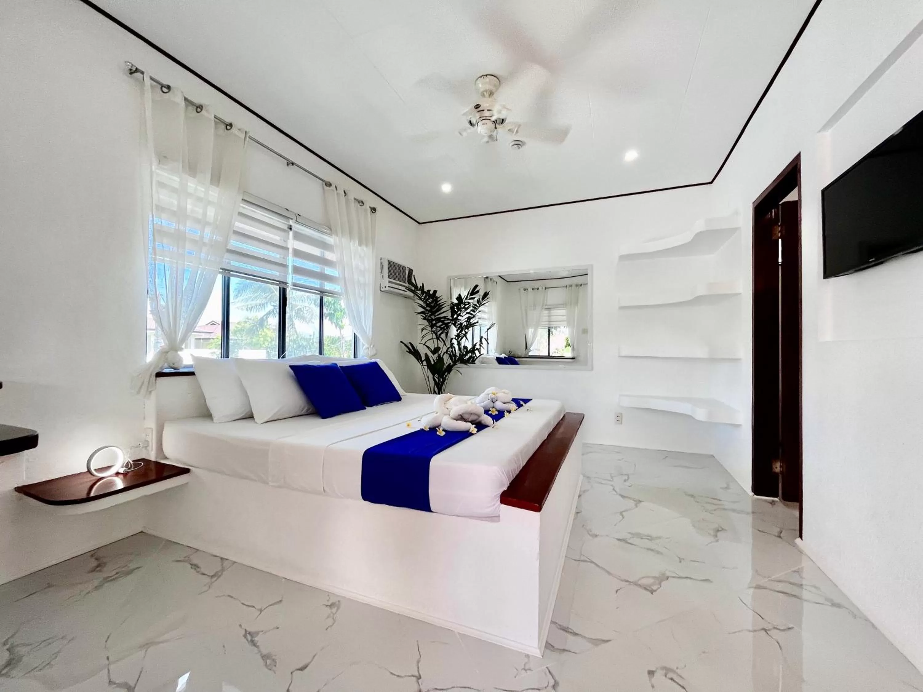 Bed in Pawikan Boutique Hotel