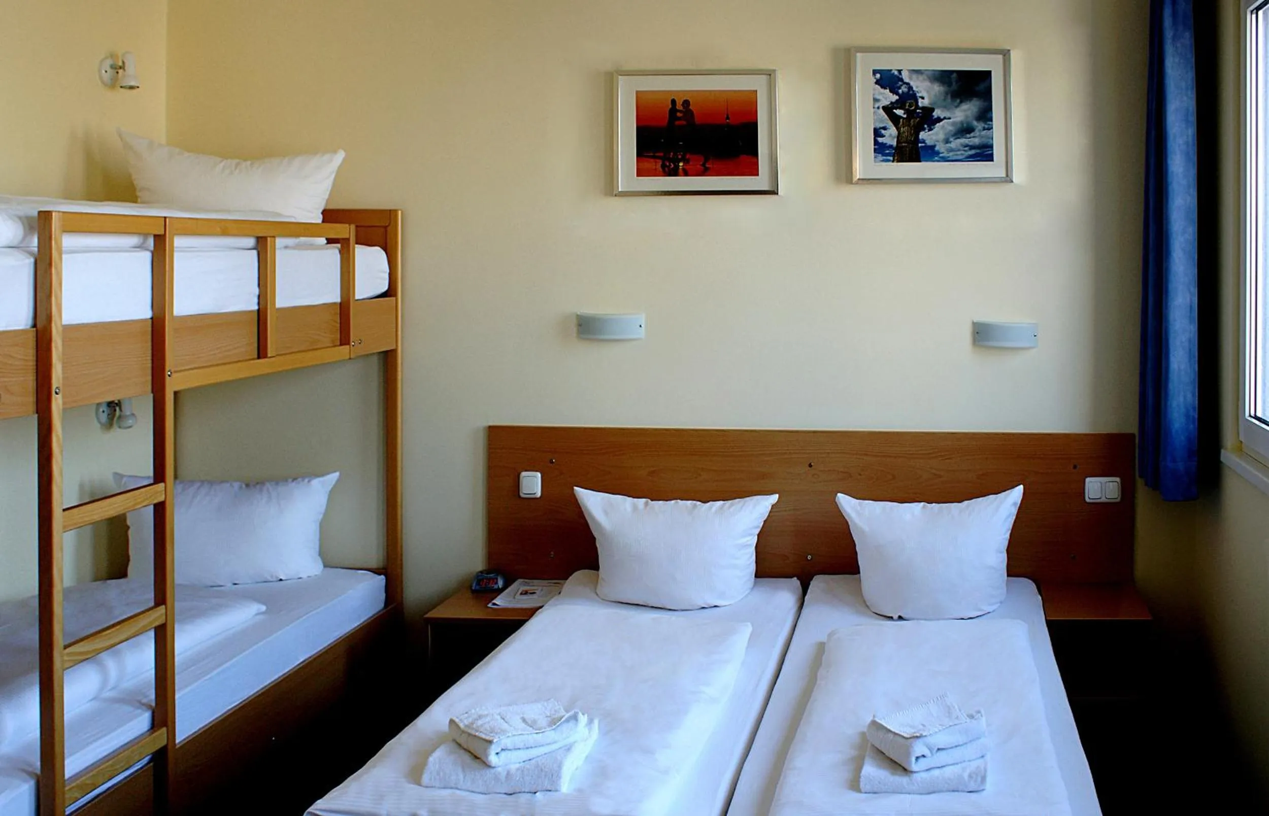 Photo of the whole room, Bed in Familienhotel Citylight