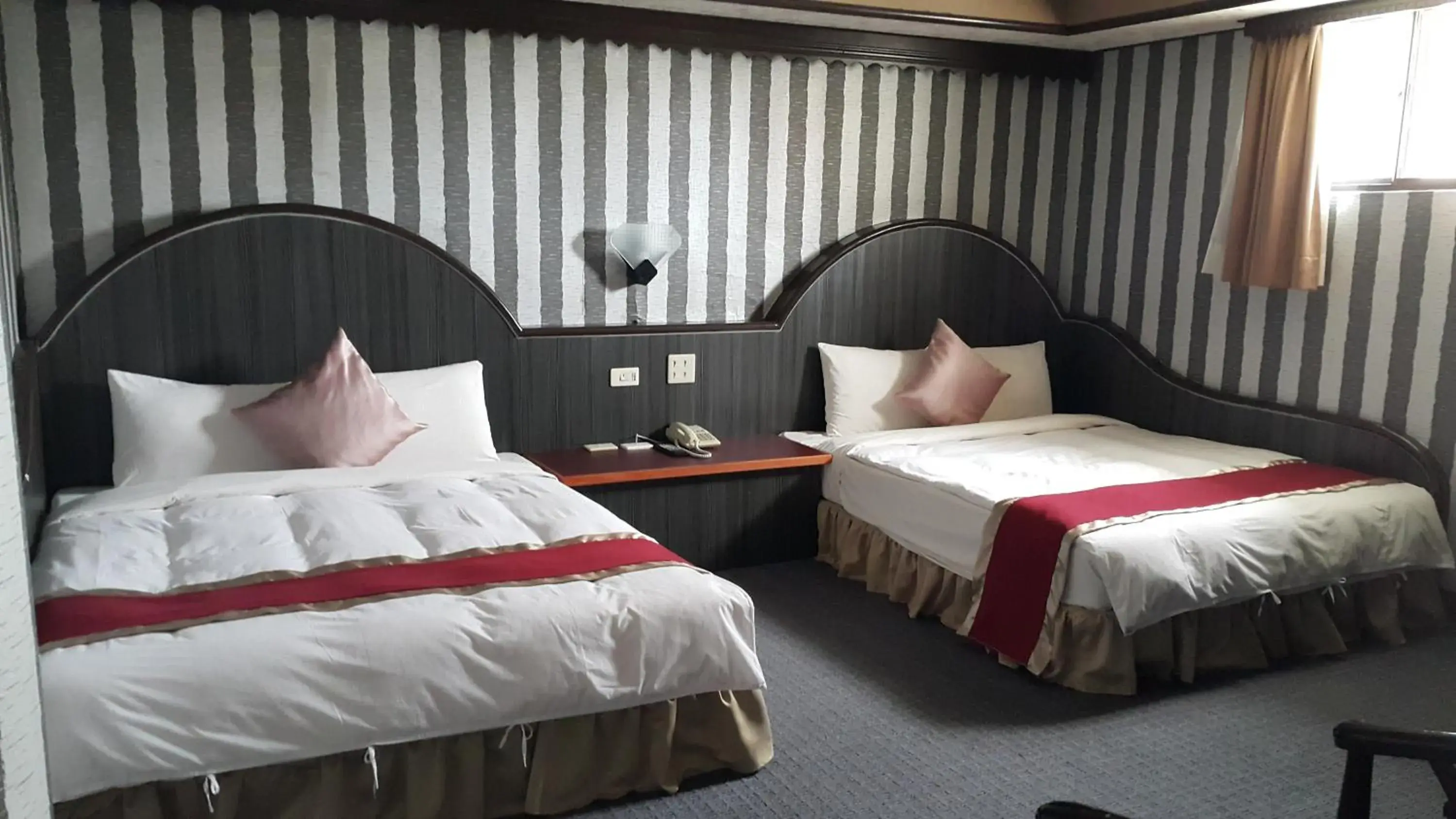 Bed in Mei-Hua Hotel