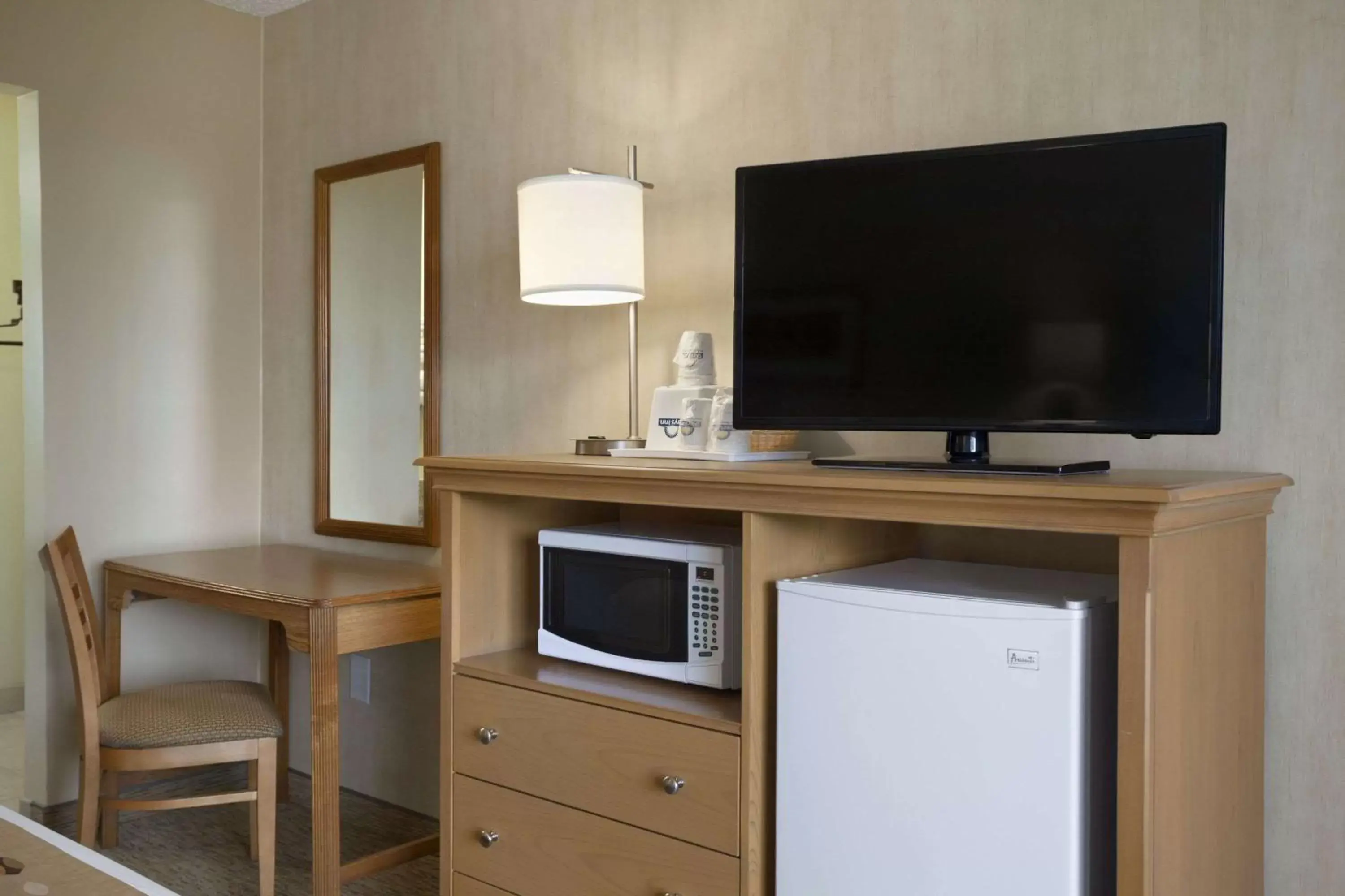 Photo of the whole room, TV/Entertainment Center in Days Inn of Frederick by Wyndham