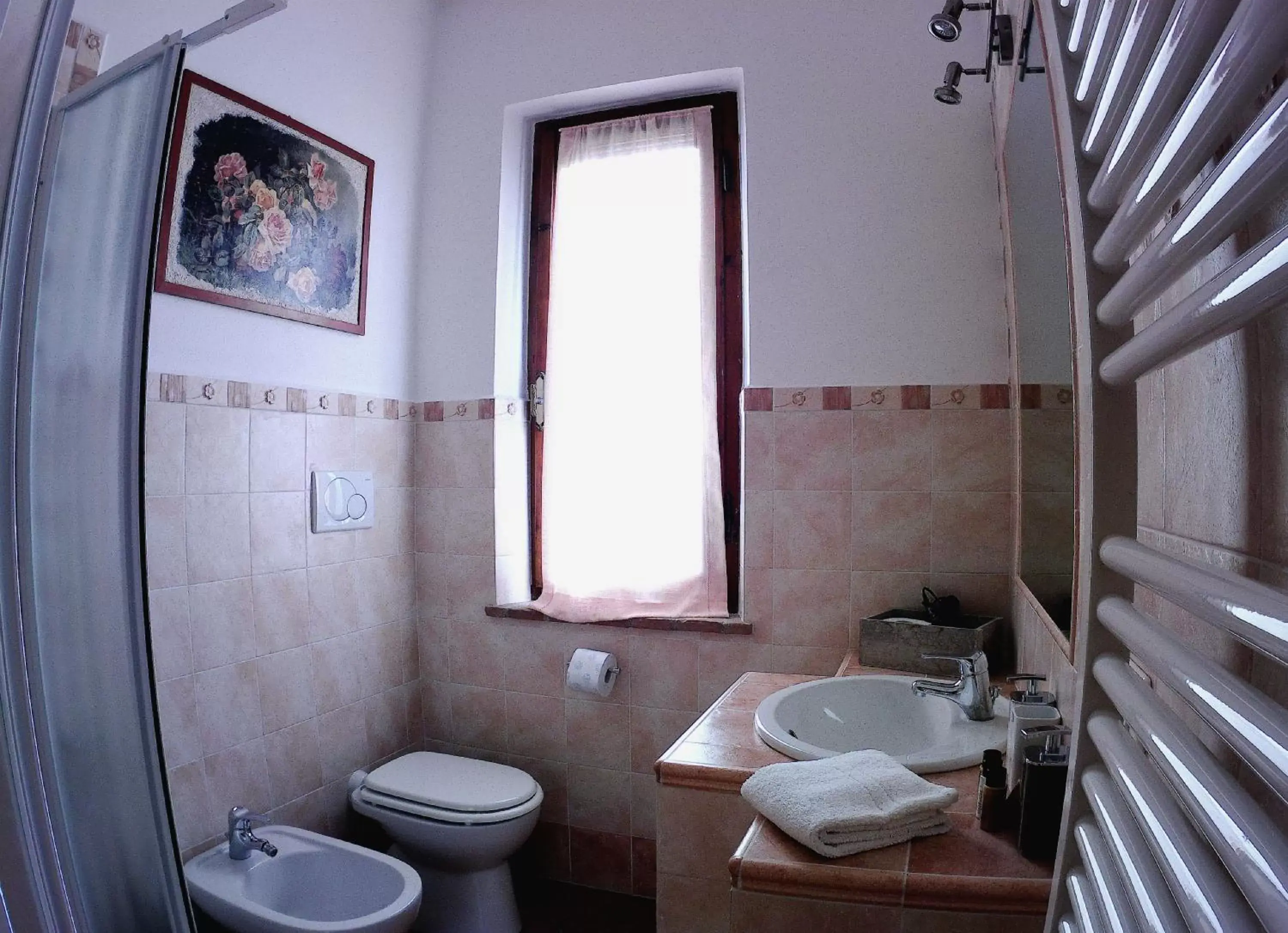 Bathroom in La Casa tra Gli Ulivi Cottage House