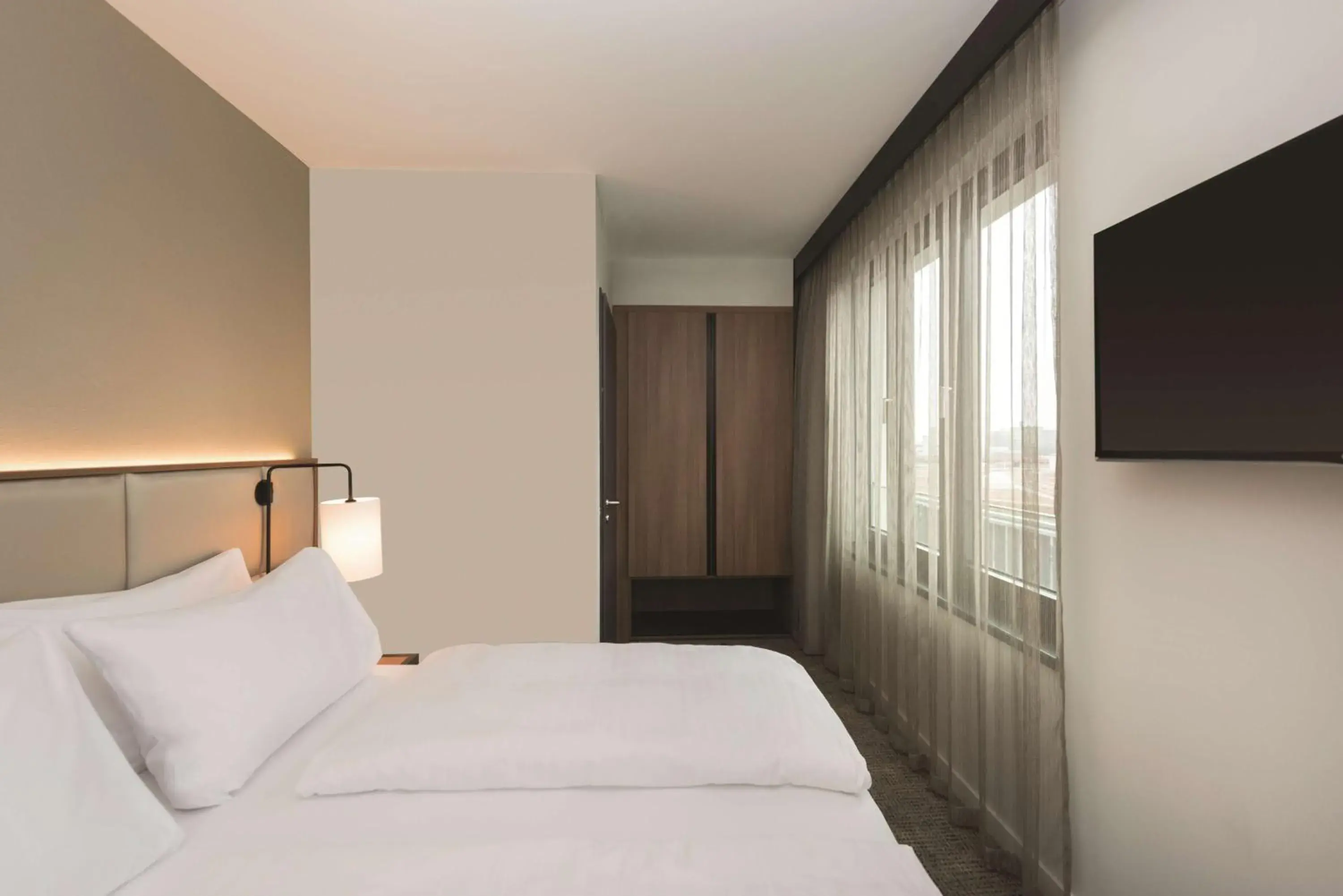 Bedroom, Bed in Adina Apartment Hotel Frankfurt Westend