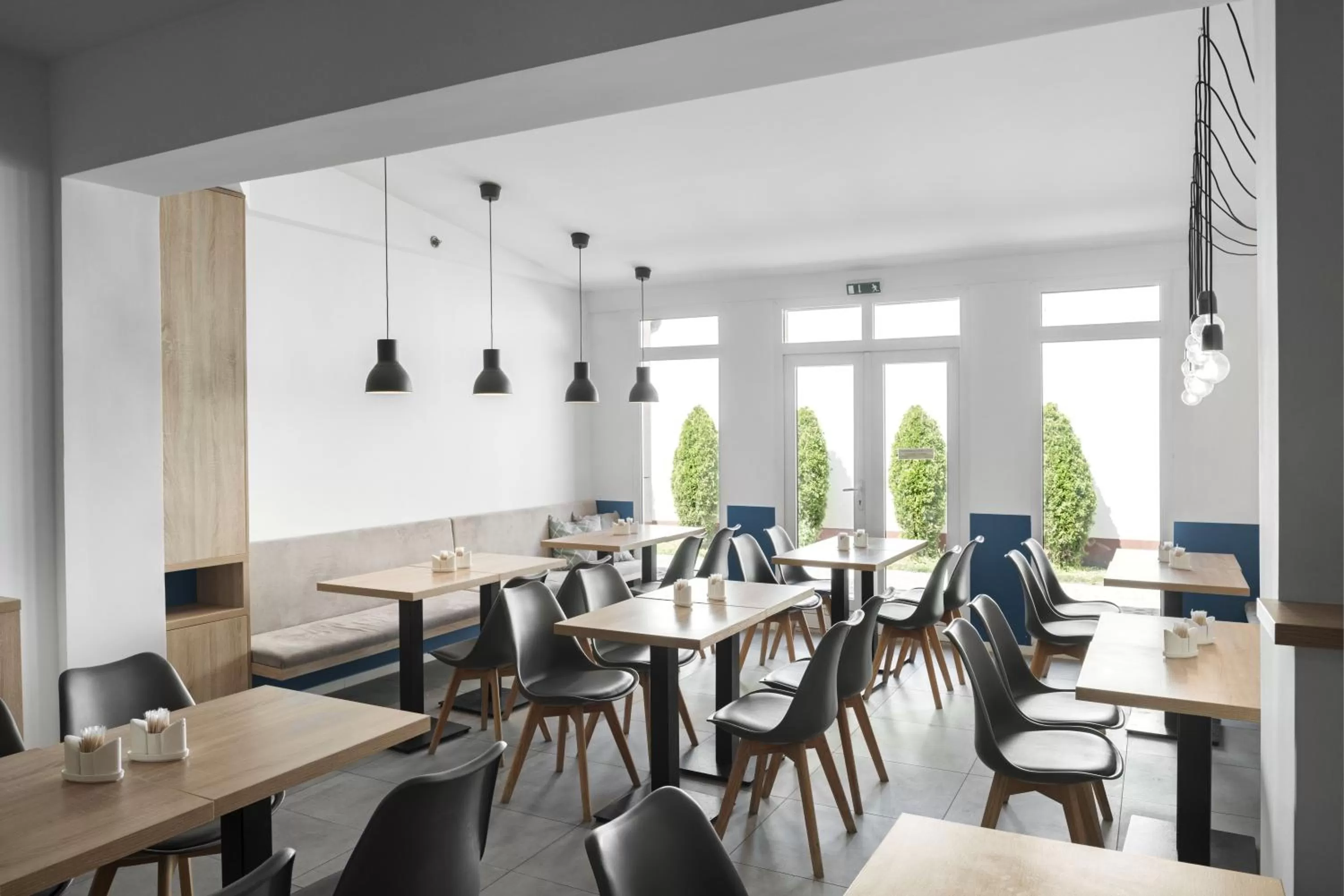 Dining area in Chesscom Hotel