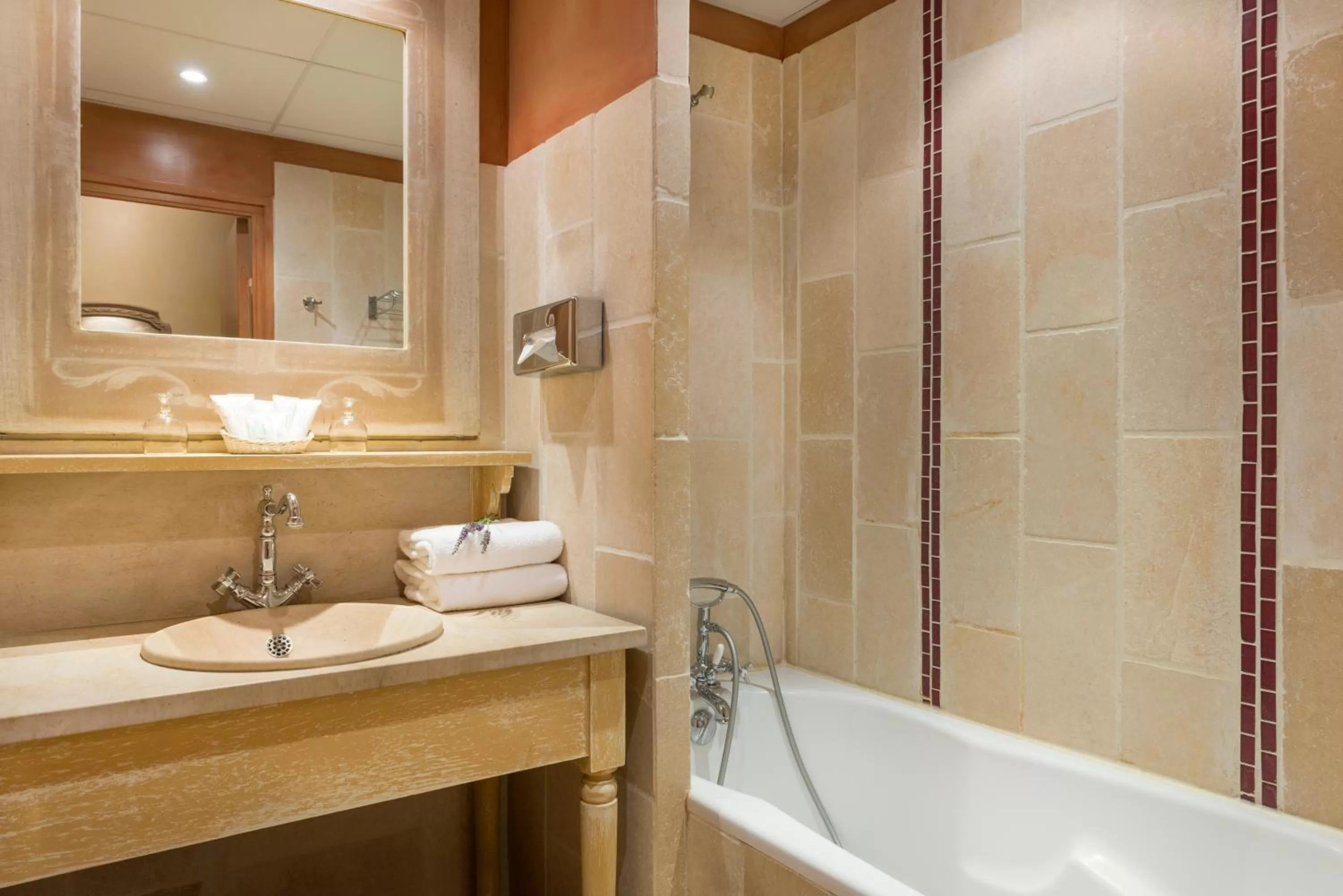 Bathroom in Hôtel Aux Vieux Remparts, The Originals Relais