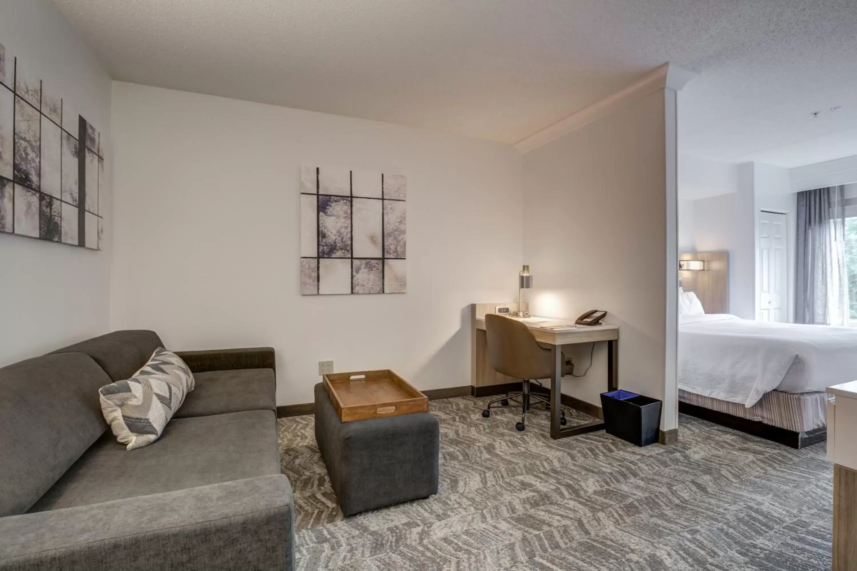 Bed, Seating Area in SpringHill Suites Gainesville