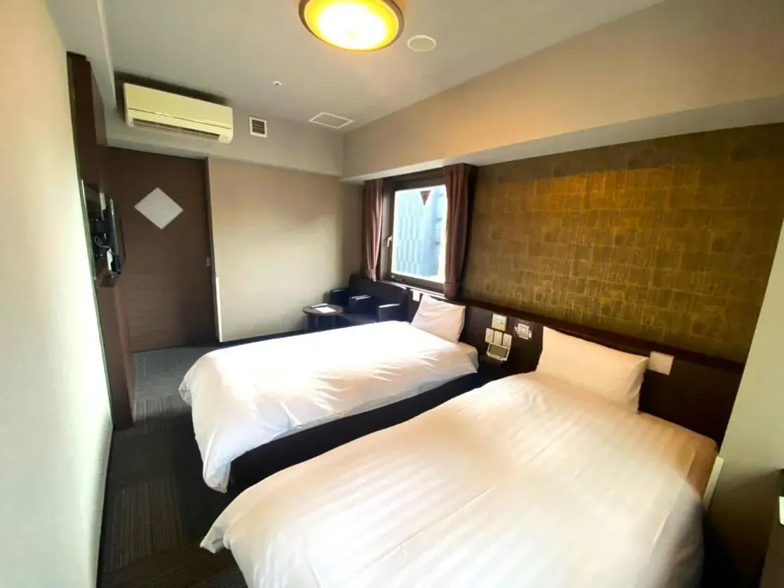 Bed in Dormy Inn Premium Namba Natural Hot Spring