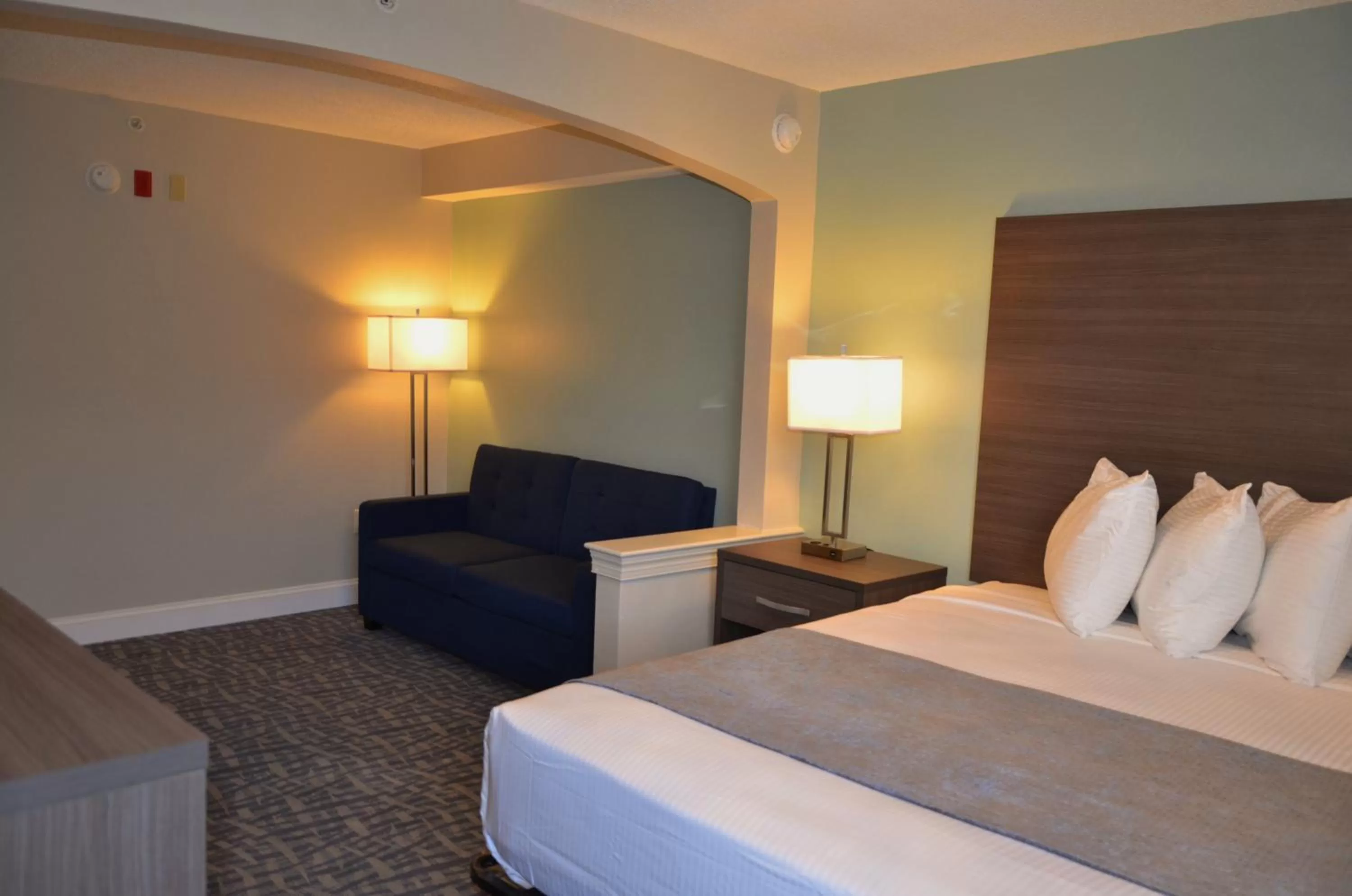 Bed in Opal Hotel & Suites