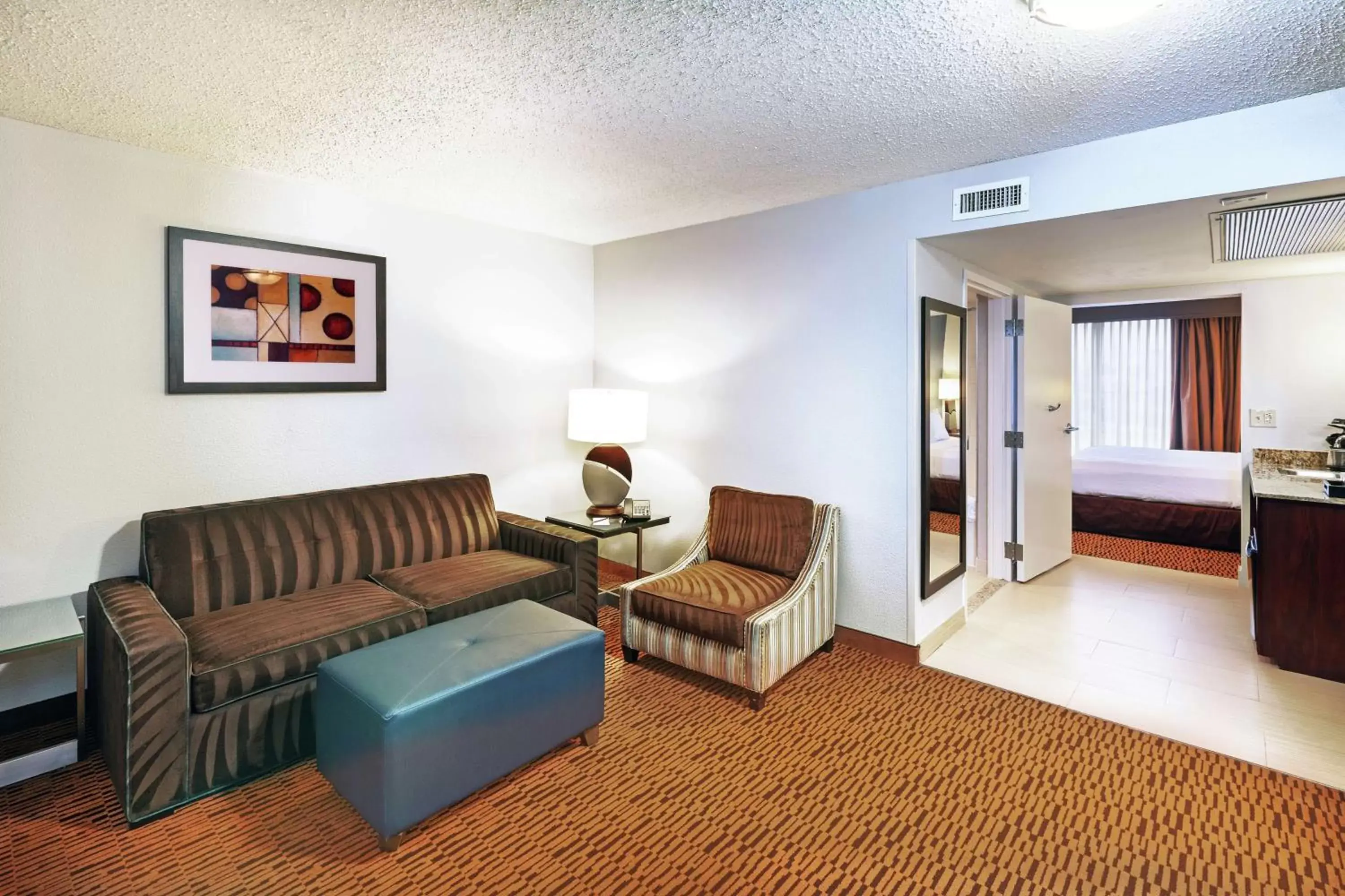 Living room, Seating Area in Embassy Suites by Hilton Dallas Market Center