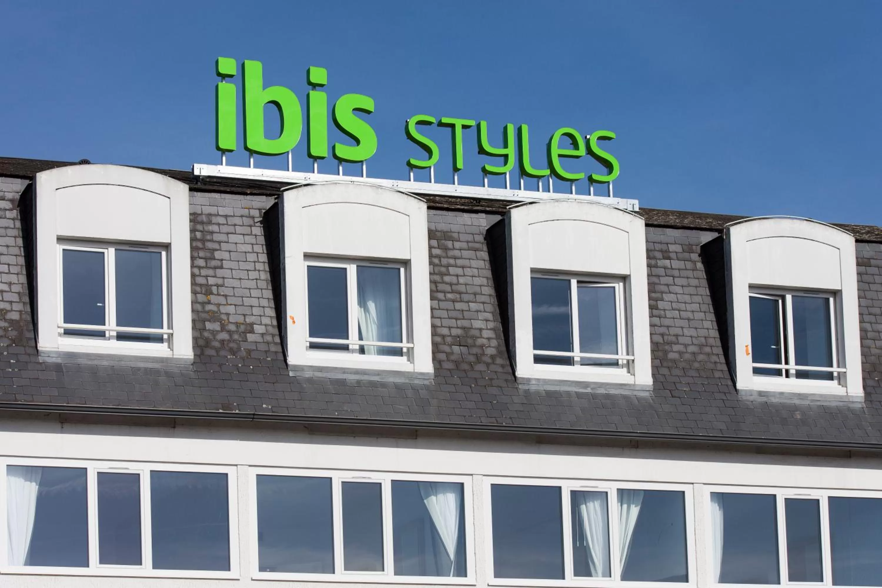 Property logo or sign in ibis Styles Poitiers Nord