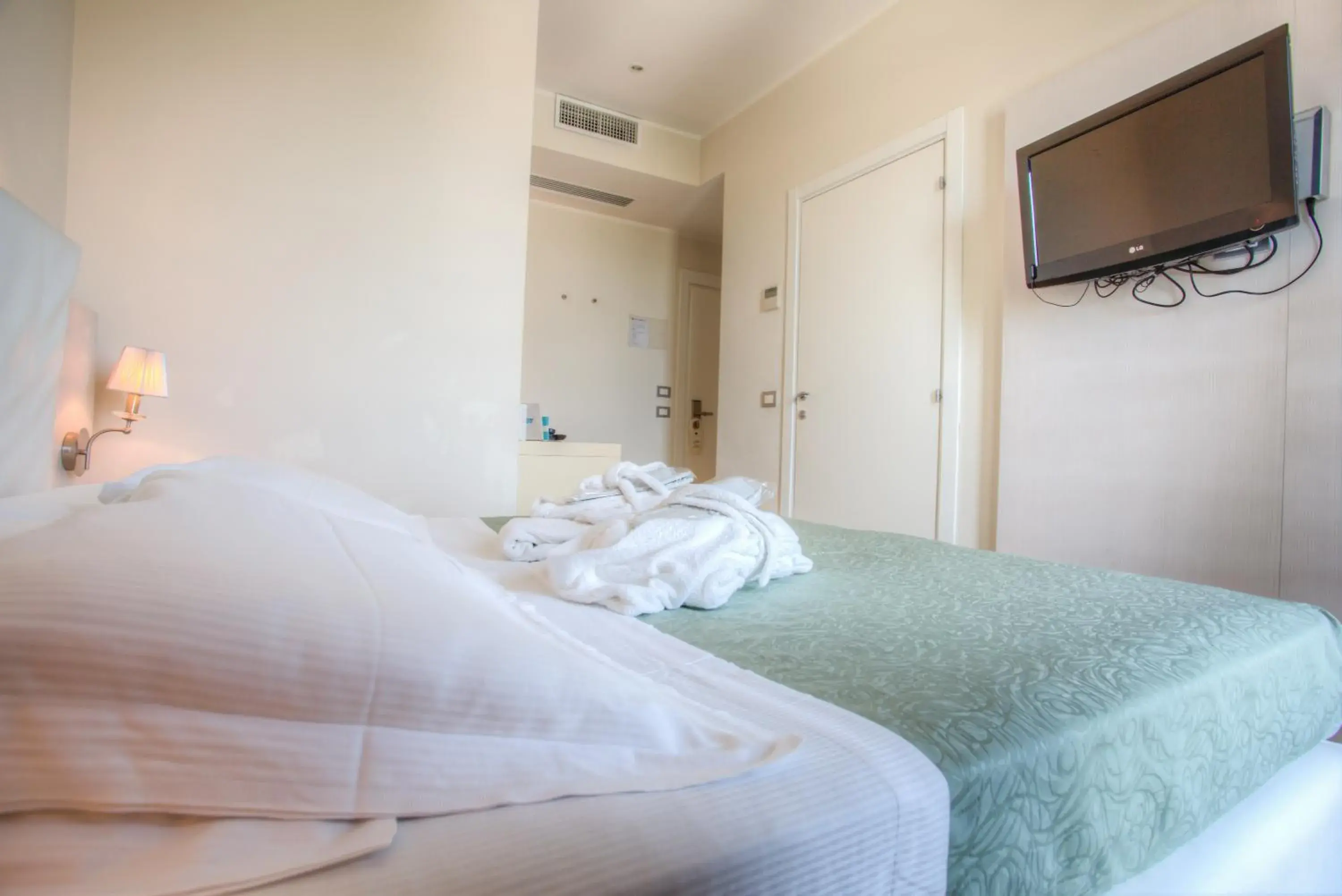 Bed in Ferretti Beach Hotel