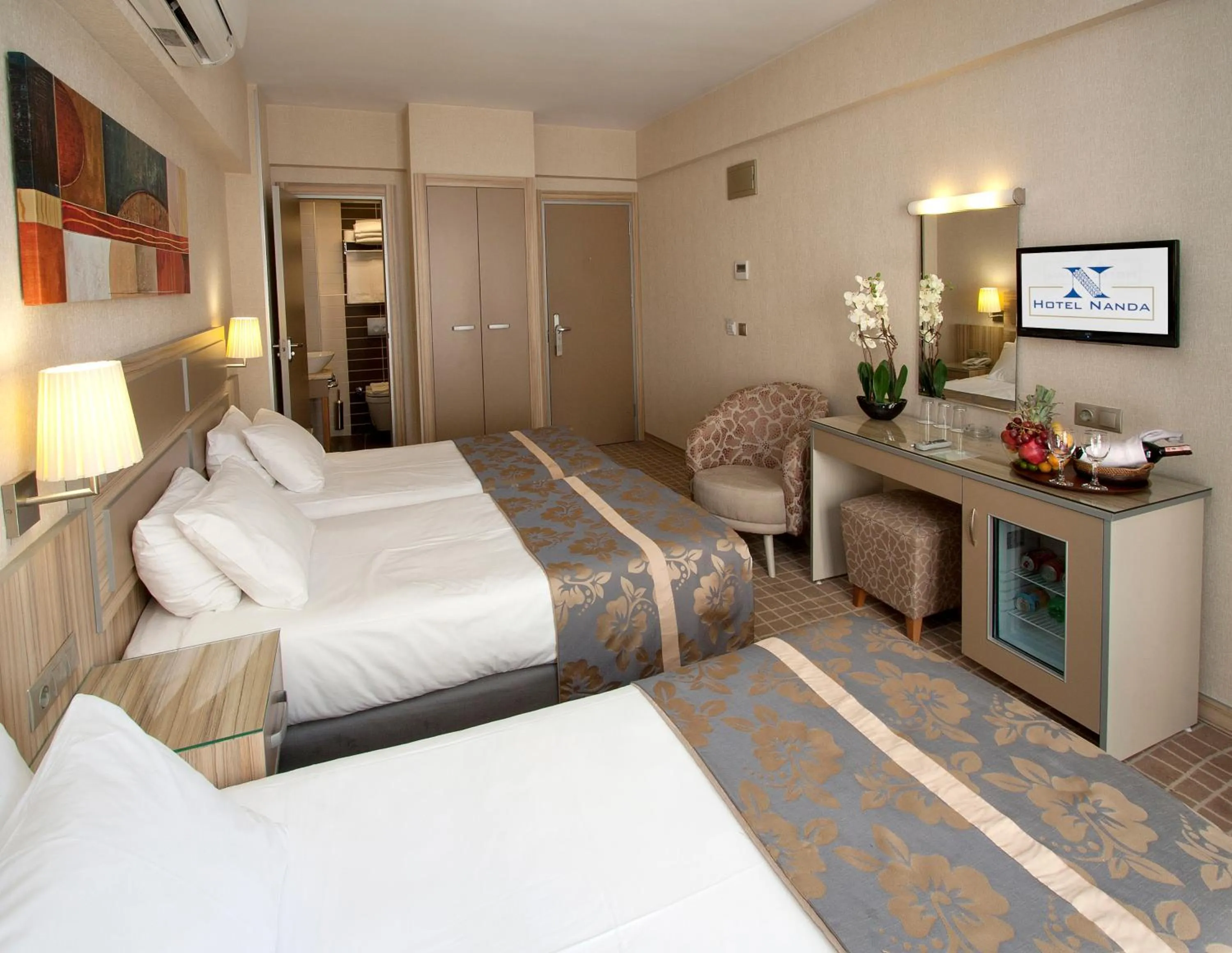 Photo of the whole room, Bed in Nanda Hotel