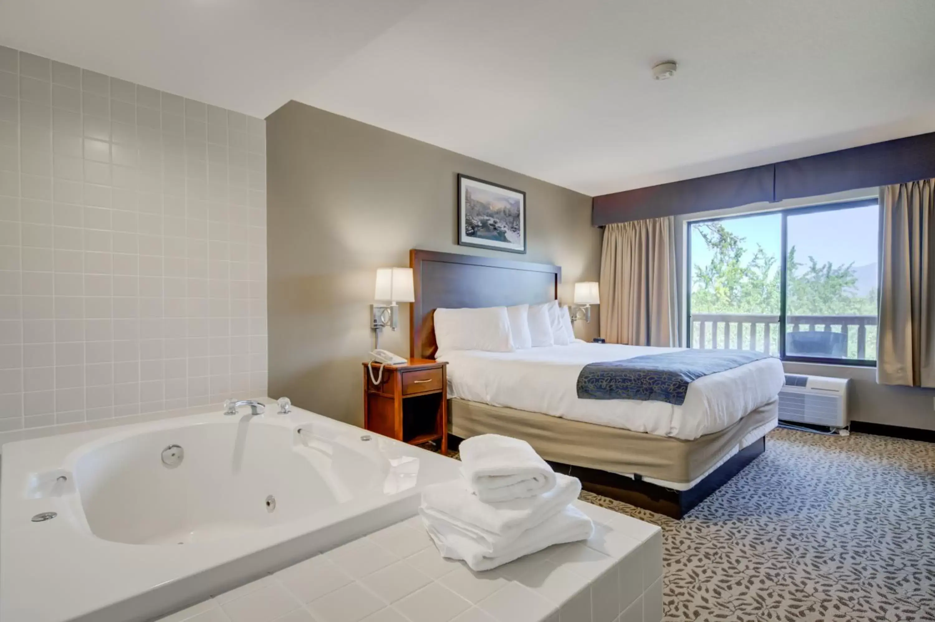 Bedroom in The Pine Lodge on Whitefish River, Ascend Hotel Collection