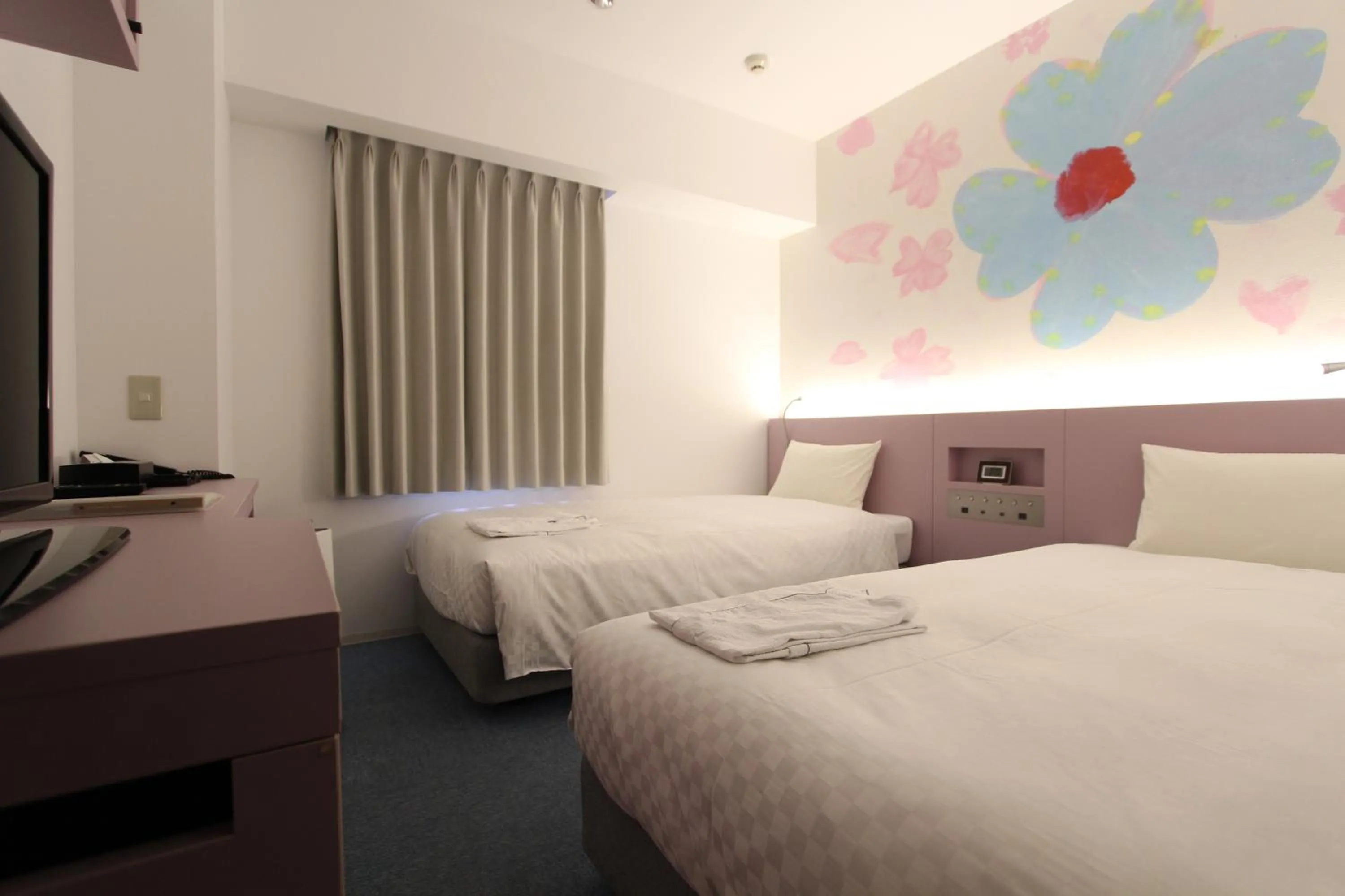 Bed in KOKO HOTEL Osaka Namba Ebisucho