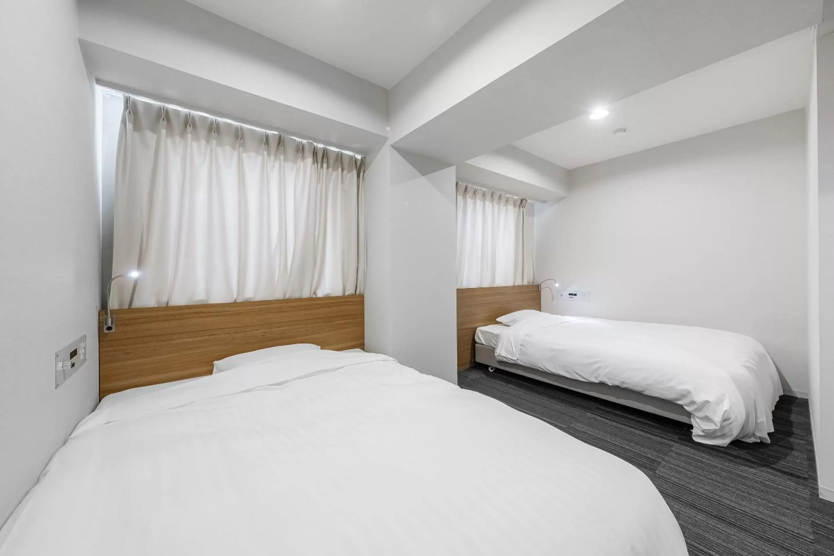 Bed in Tabist Annex Hotel Tetora Hakodate