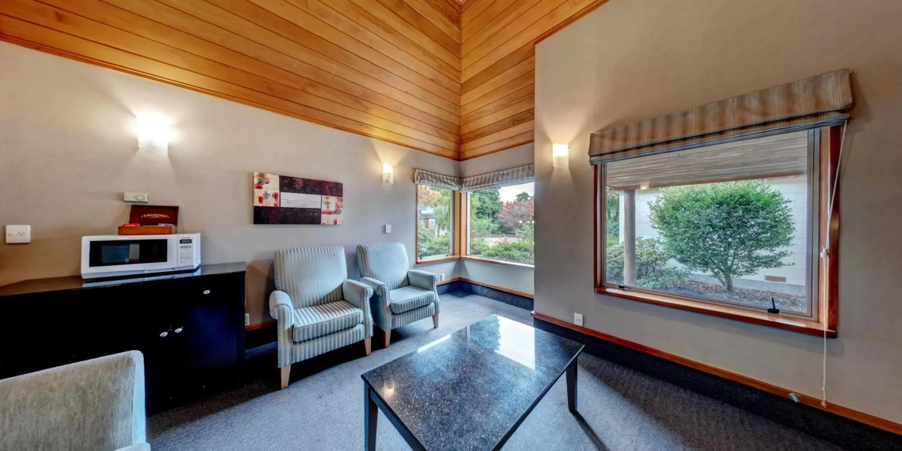 Bed, Seating Area in Distinction Te Anau Hotel & Villas