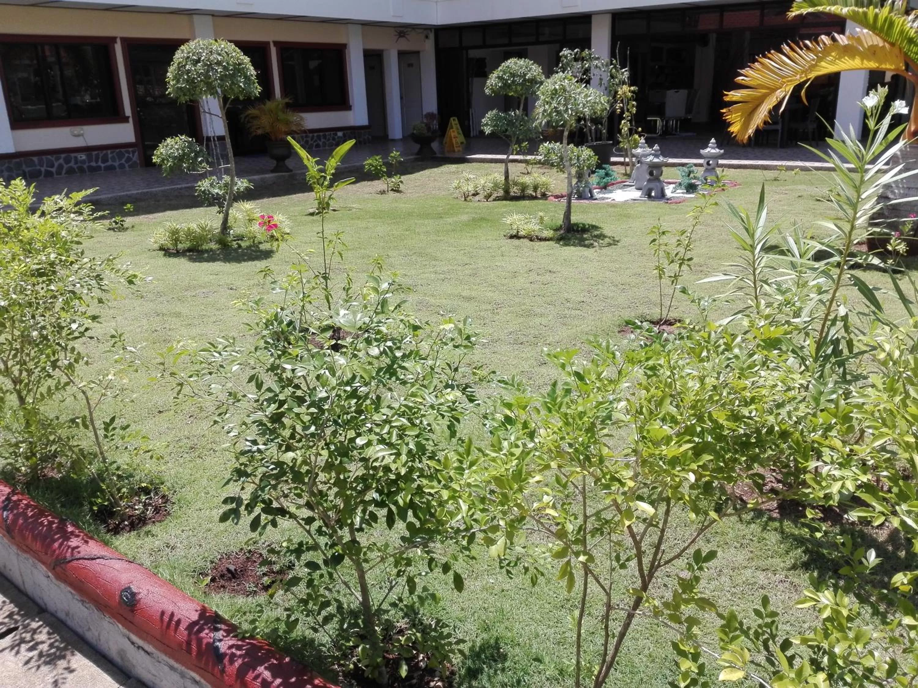 Restaurant/places to eat, Garden in Jugalis Hotel and Restaurant