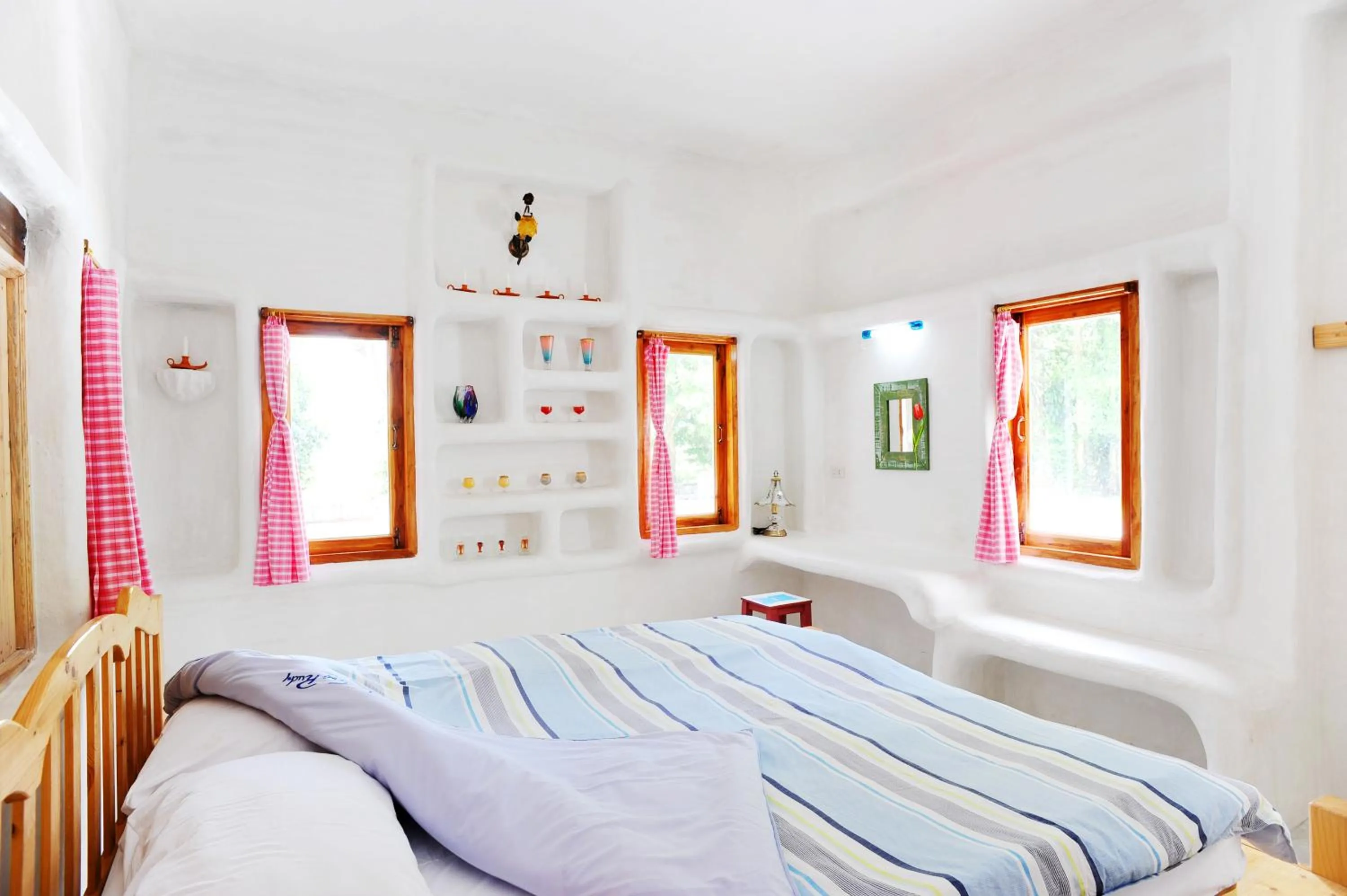 Bed in Scenic Riverside Resort