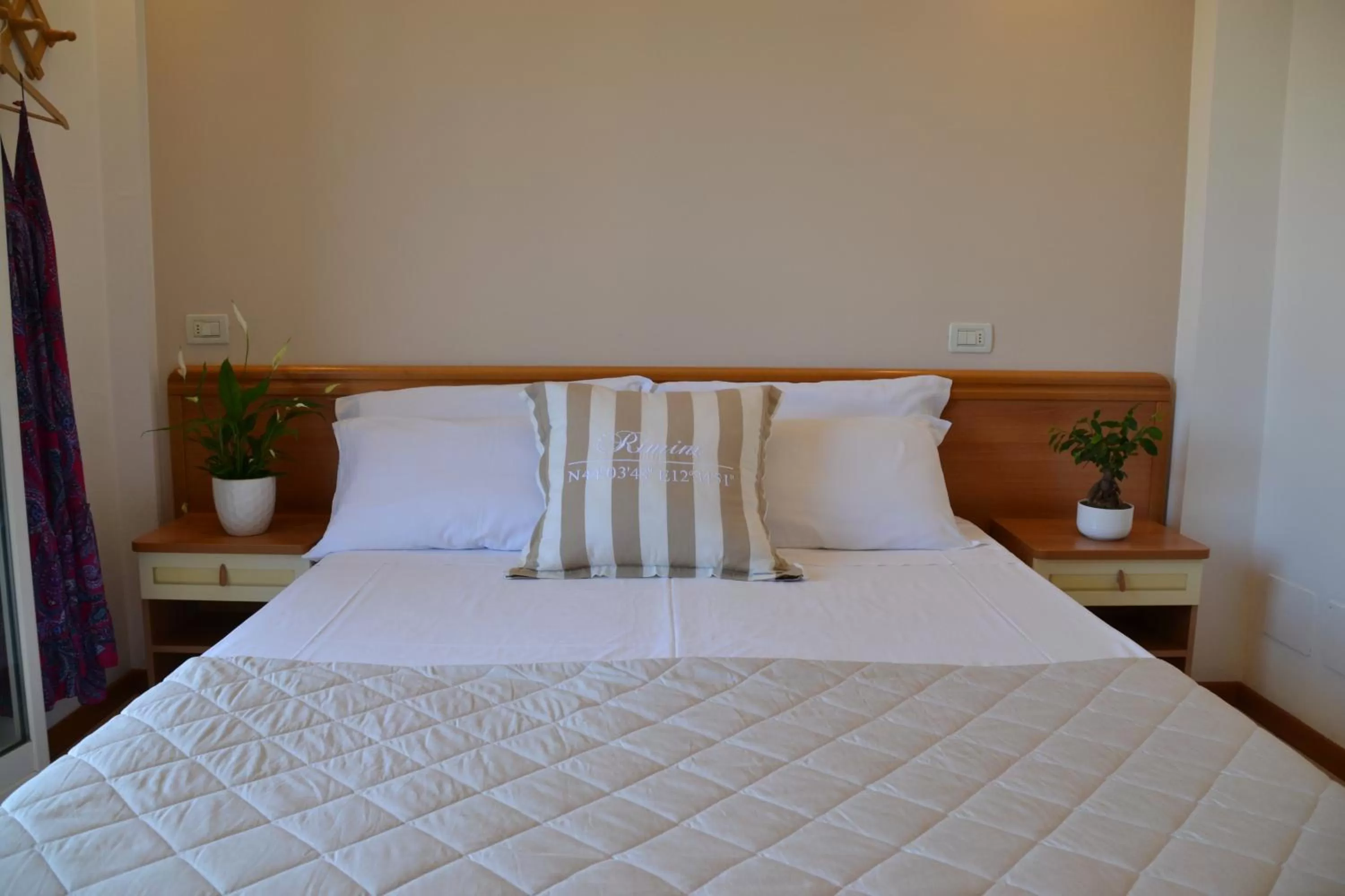 Bed in Hotel Apogeo - Breakfast Experience