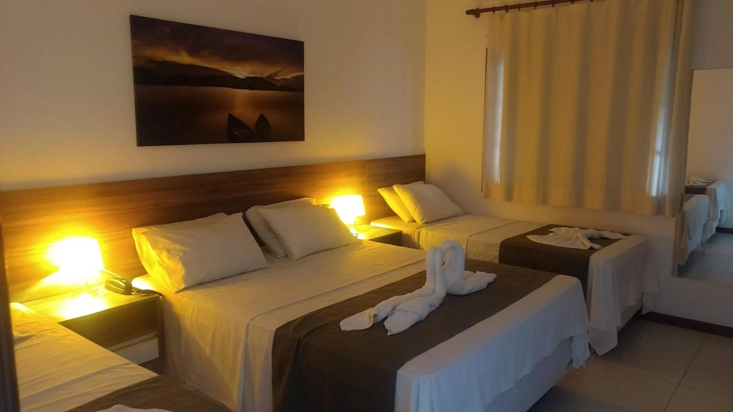 Bed in Hotel Pousada Salvador Paradise