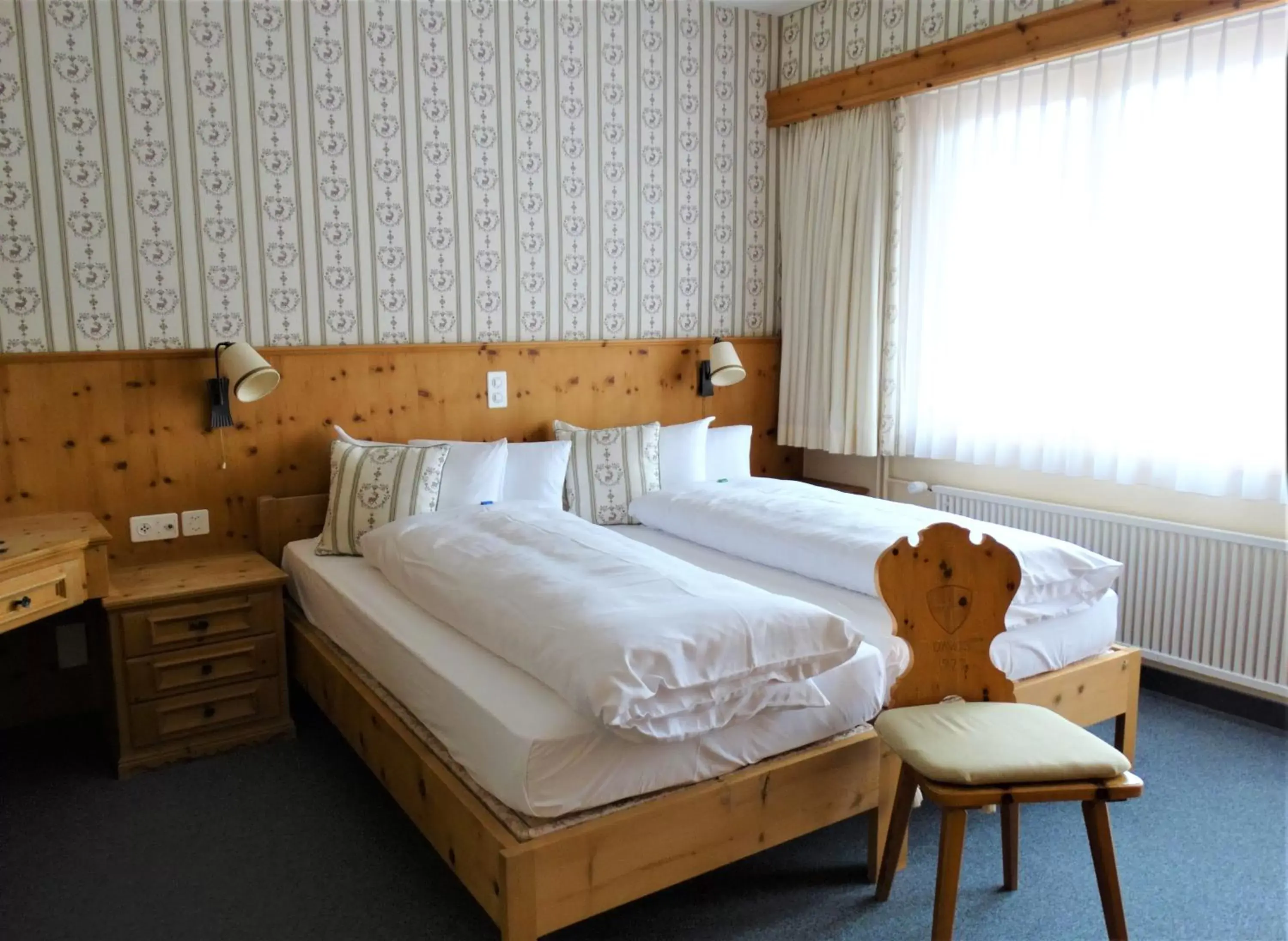 Bedroom, Bed in Hotel Bündnerhof