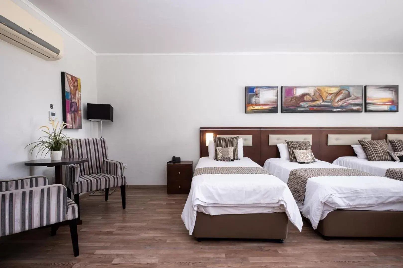 Bed in Livadhiotis City Hotel