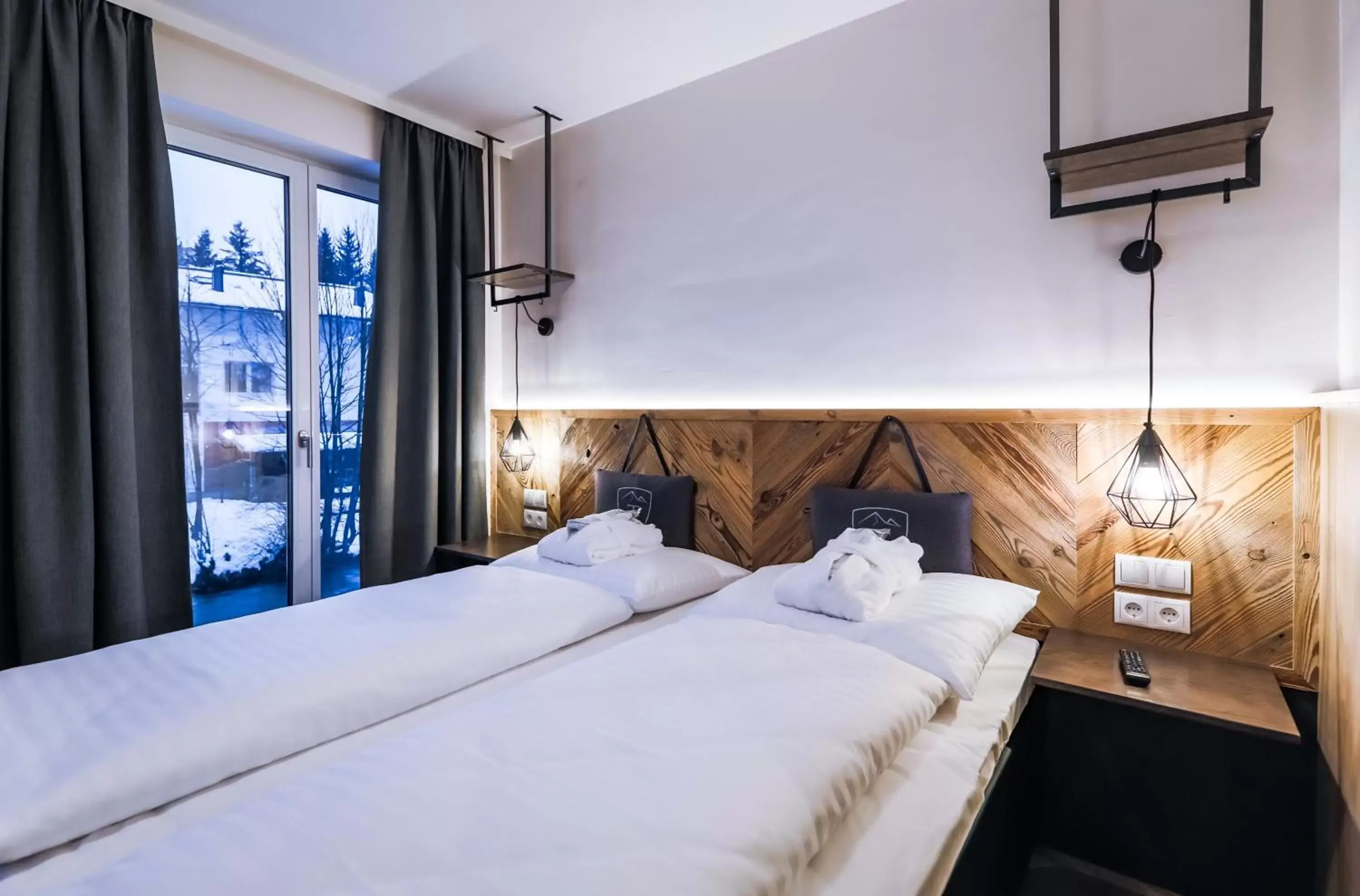 Bedroom, Bed in 24 by AvenidA Hotel & Residences Kaprun