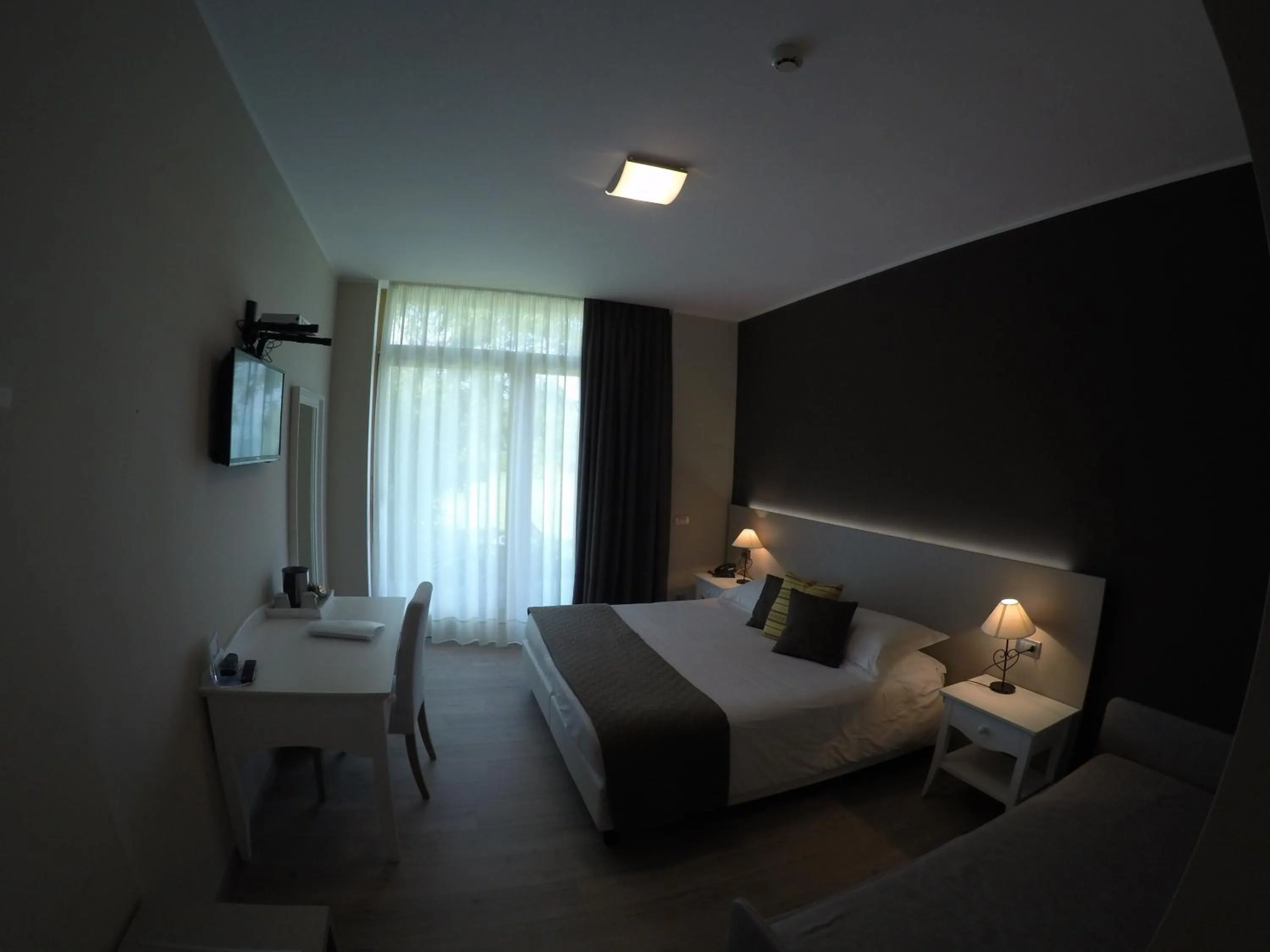 Photo of the whole room, Bed in Tullio Hotel