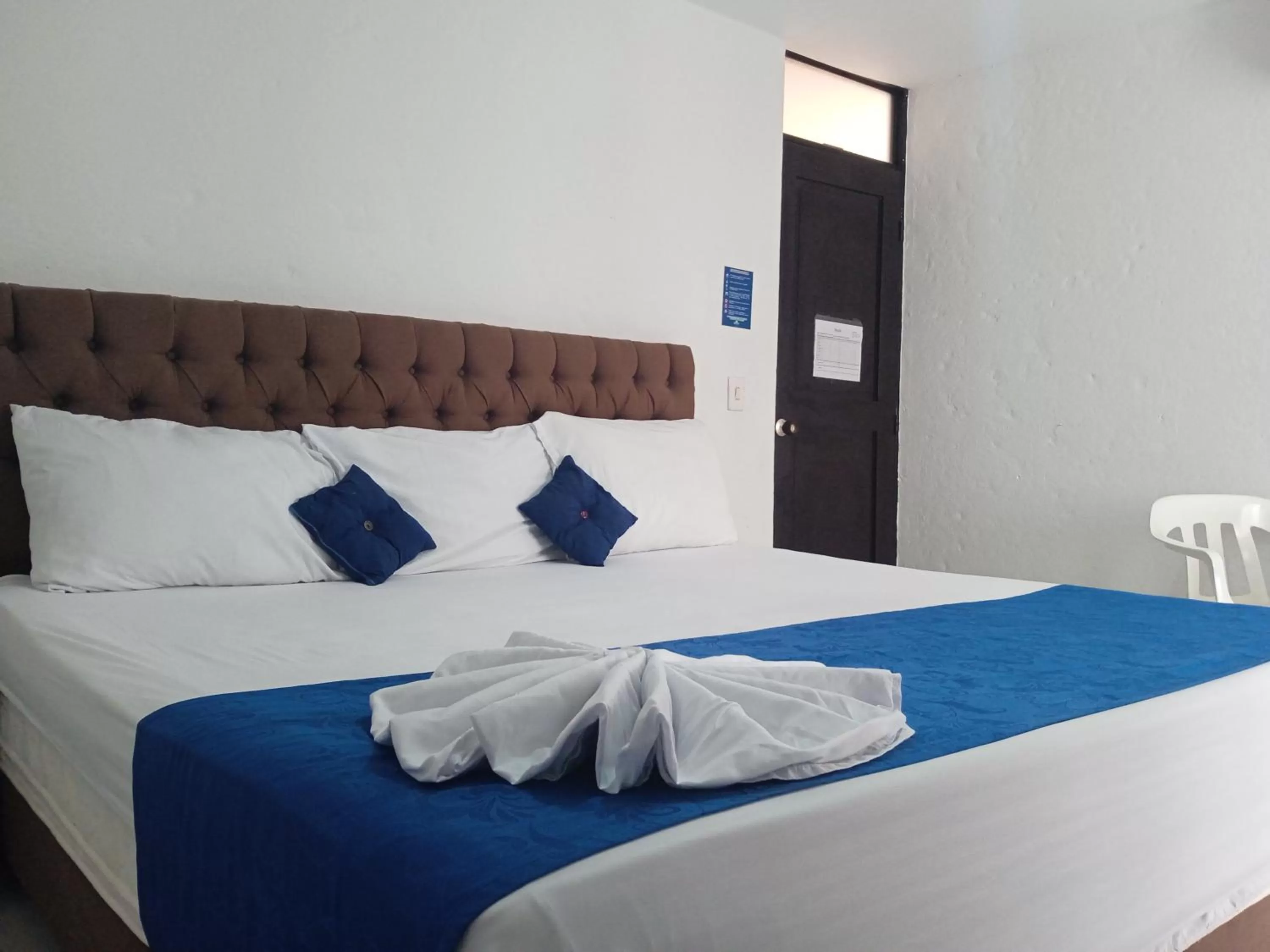 Bed in Blue Star Hotel