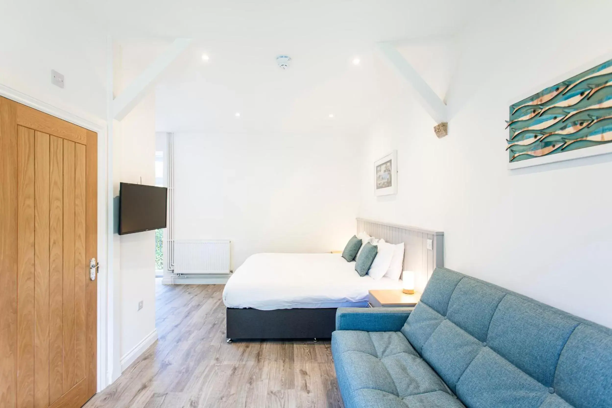 Bed, Seating Area in Tregenna Castle Resort