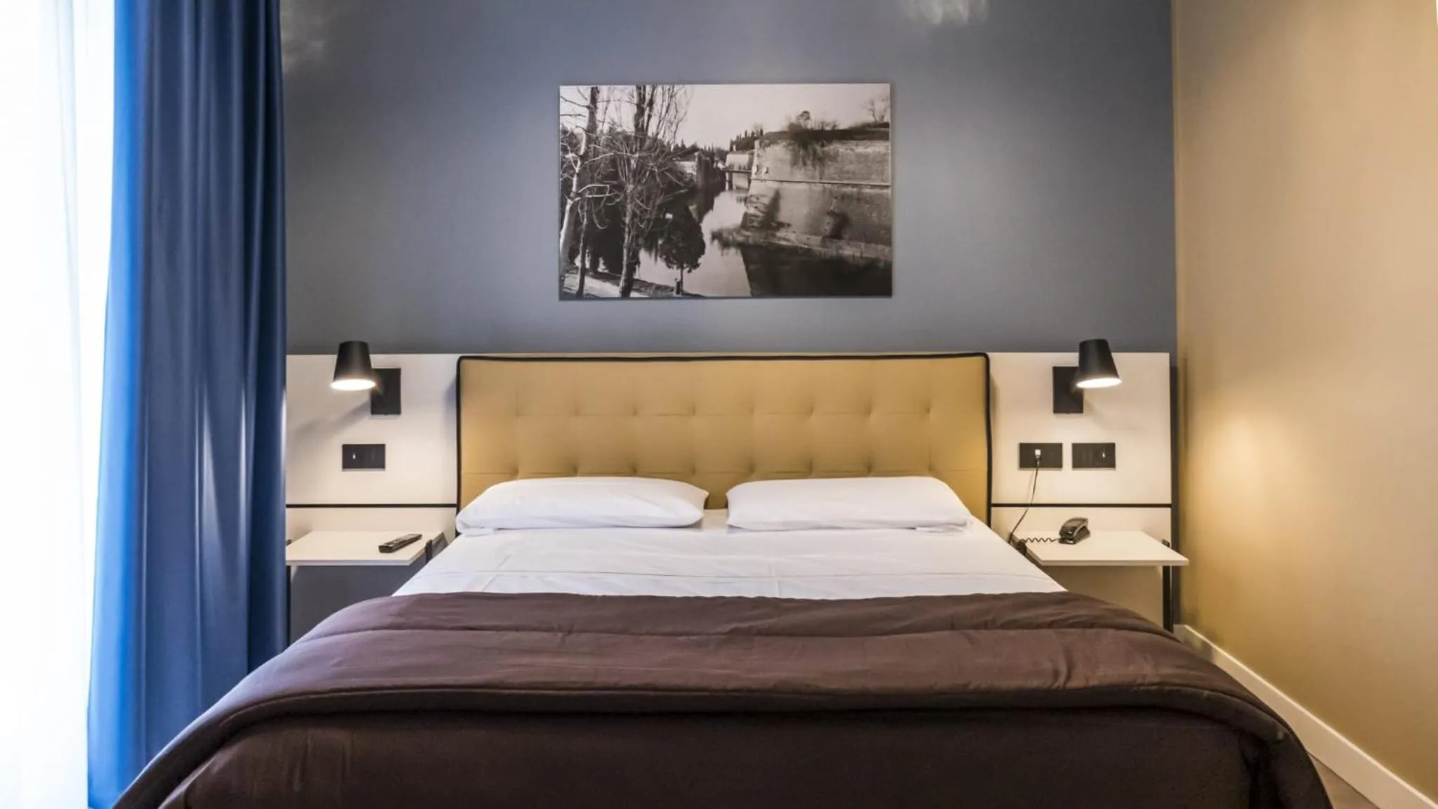 Bed in Hotel Puccini
