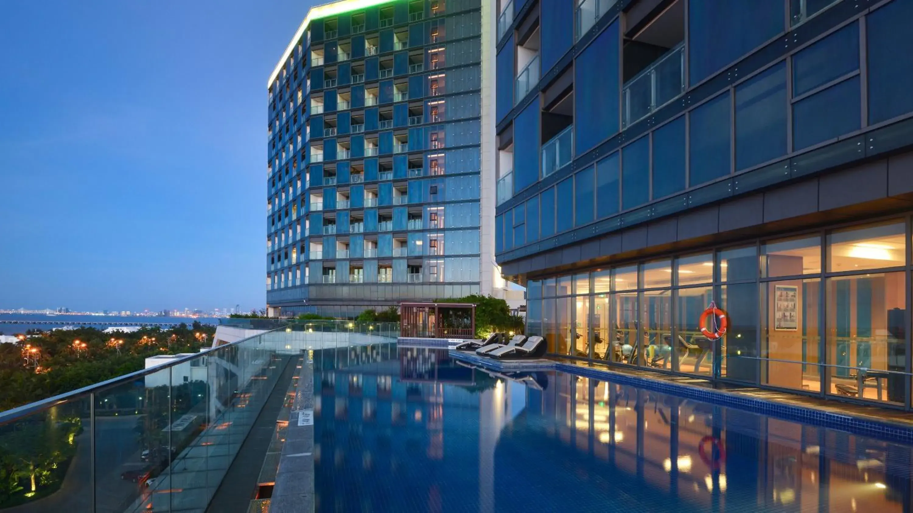 Swimming Pool in Holiday Inn Haikou West Coast, an IHG Hotel