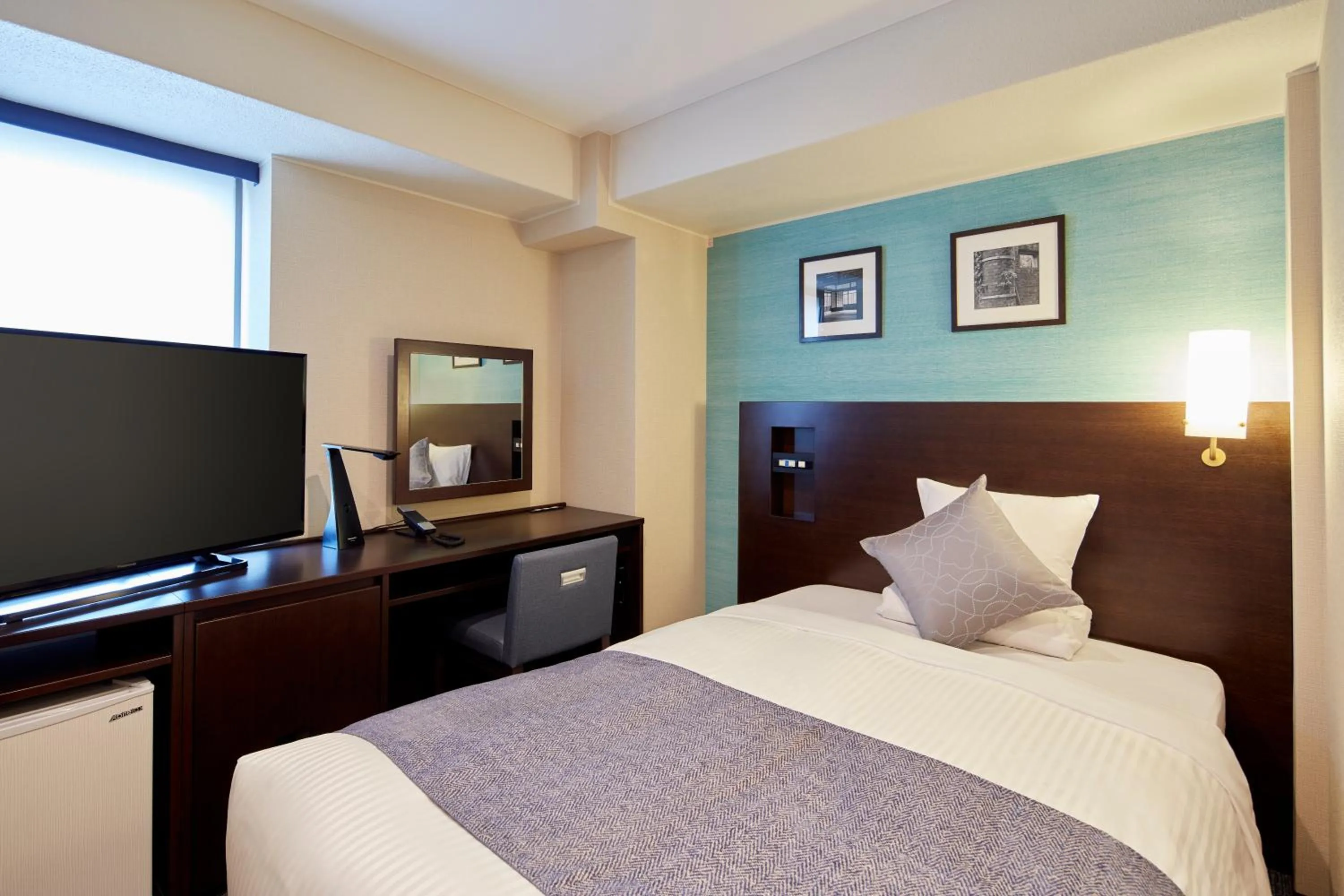 Bed in HOTEL MYSTAYS Yokohama