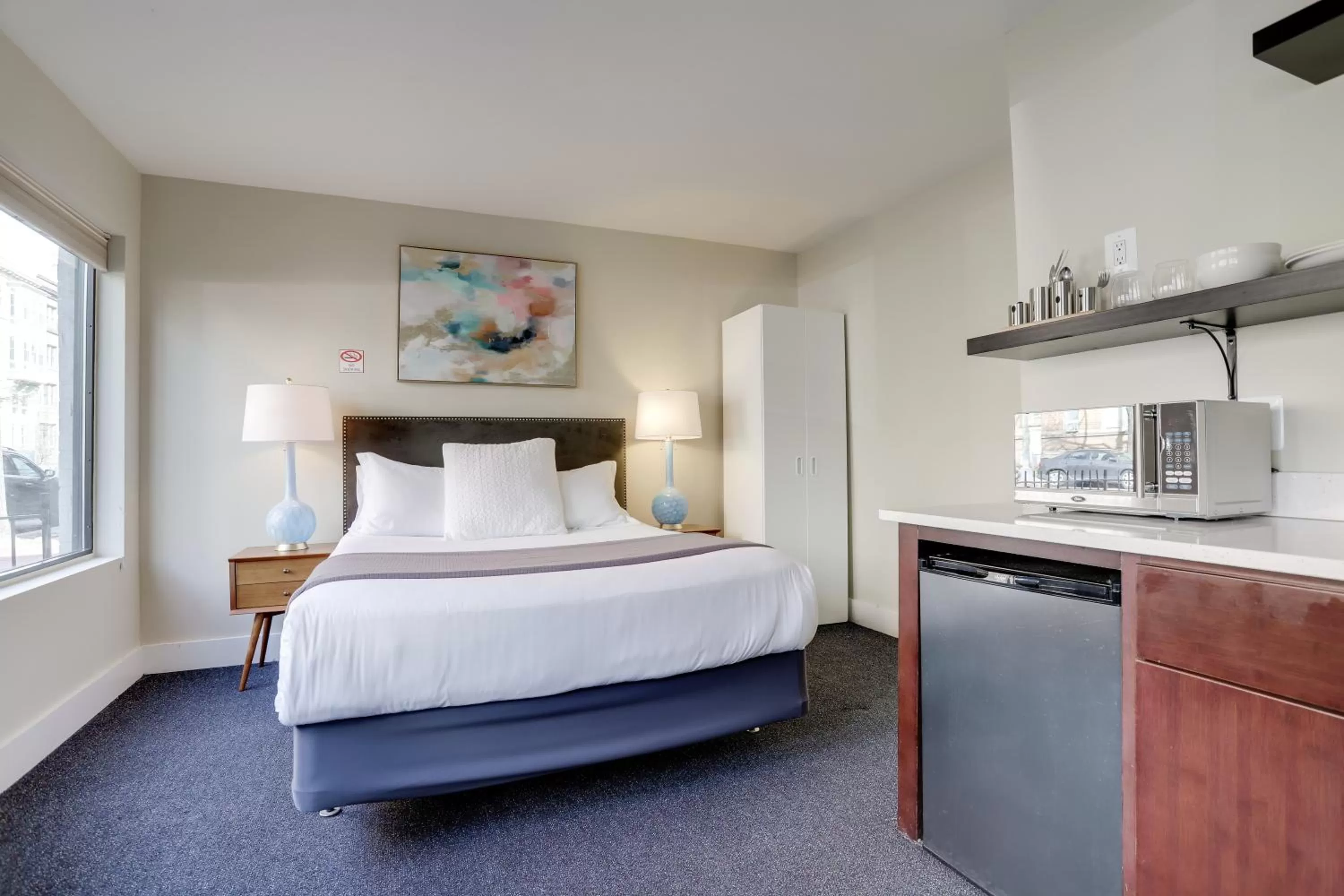 Bed in Sojourn at DuPont Place