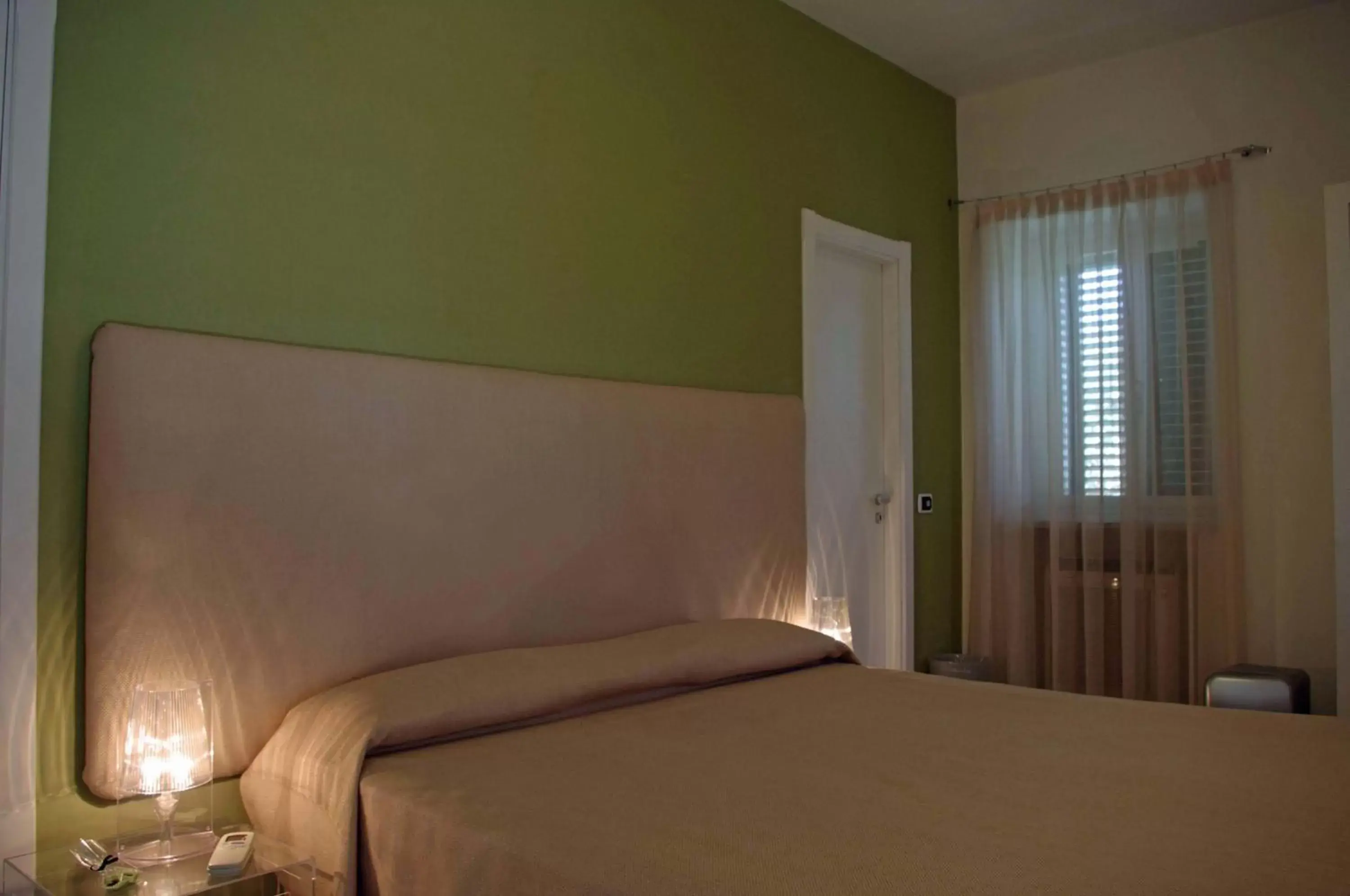 Photo of the whole room, Bed in La Piccola Locanda