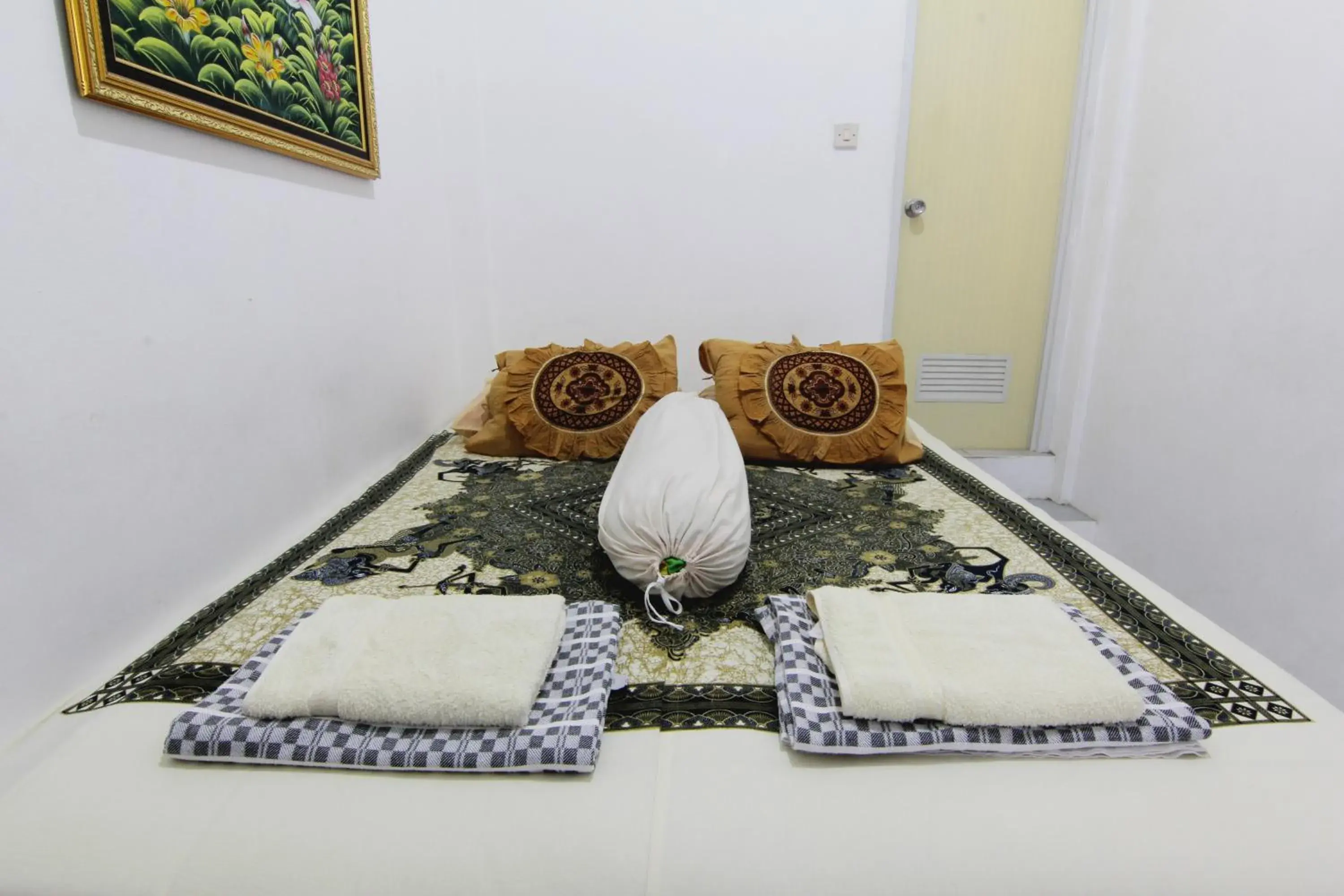 Bed in Tiga Dua Homestay