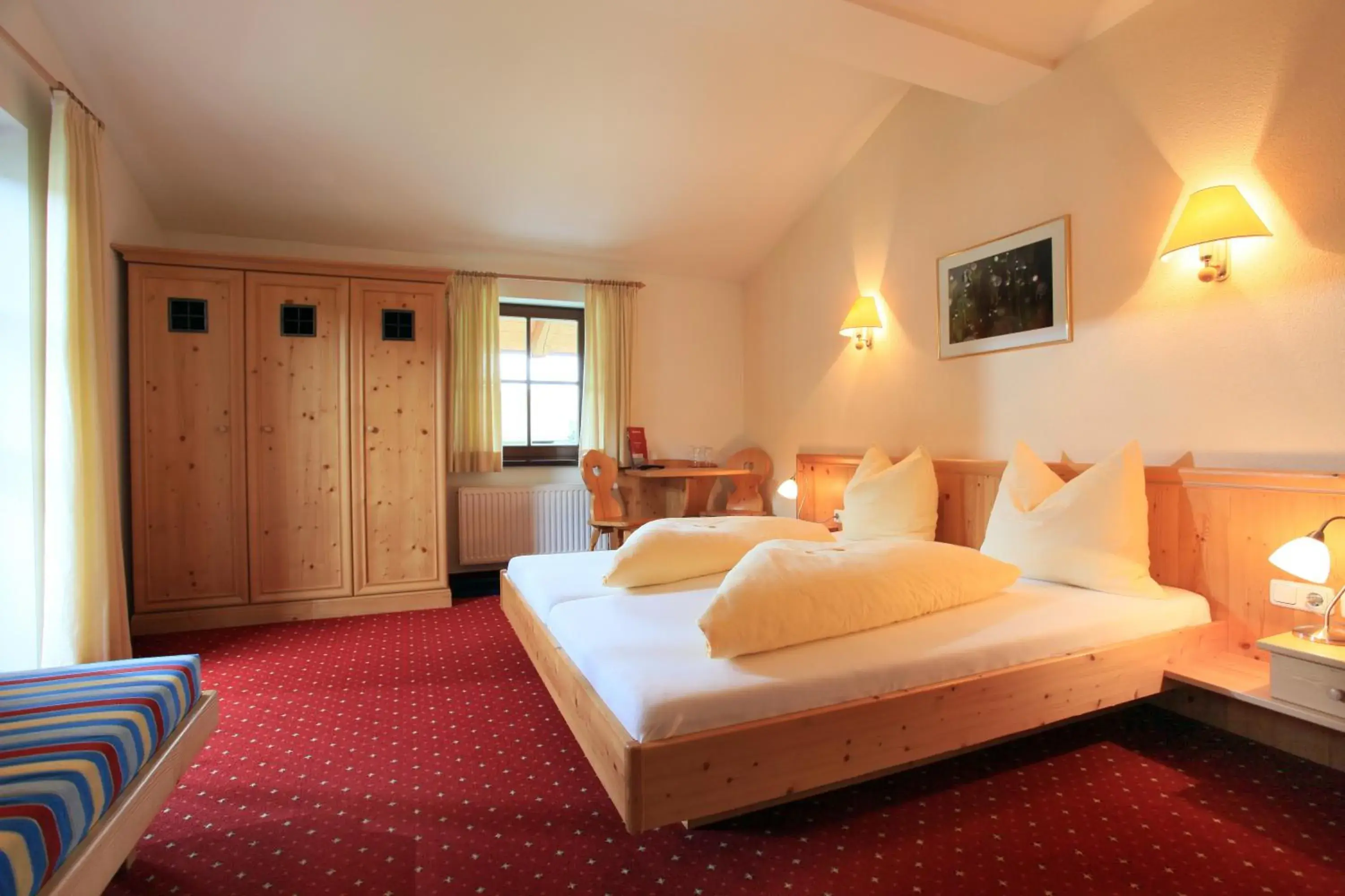 Photo of the whole room, Bed in Hotel Reitlwirt