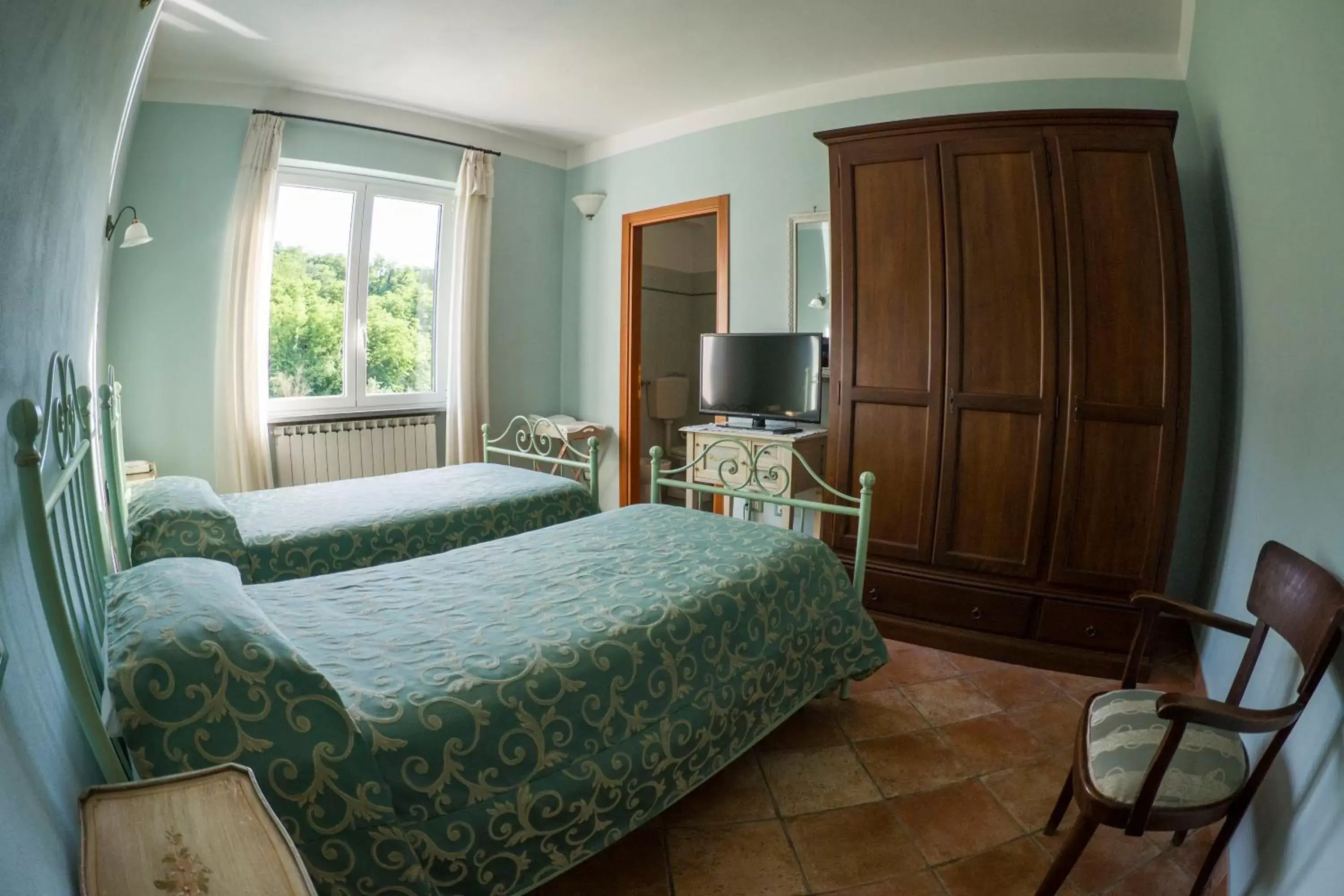 Bed in Albergo Il Sicomoro