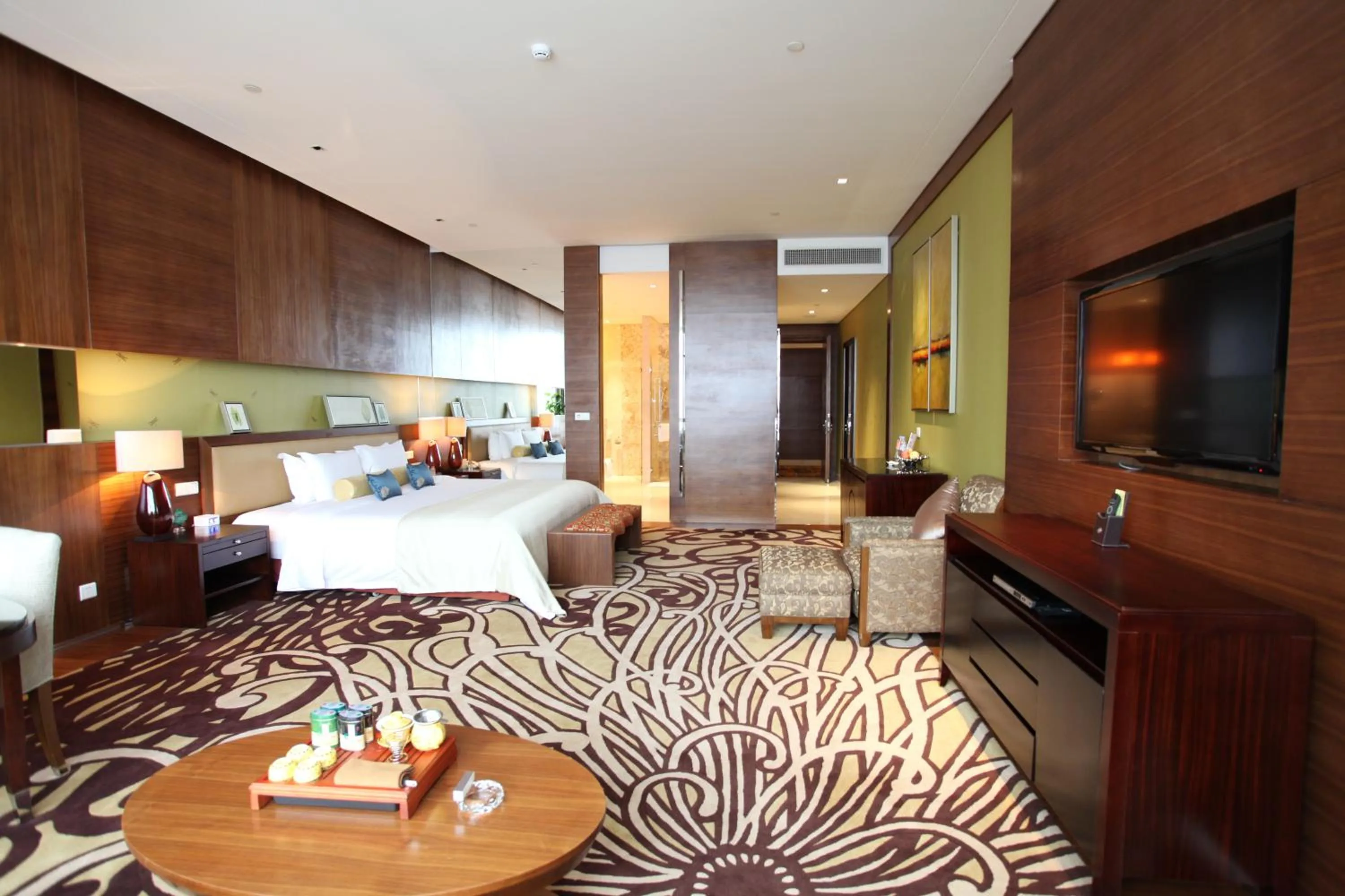 Coffee/tea facilities, Bed in HJ International Hotel