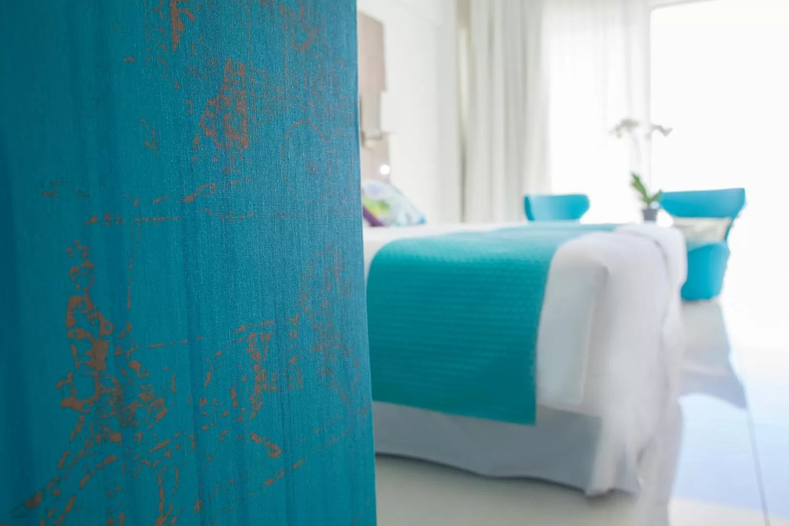 Bed in King Evelthon Beach Hotel & Resort