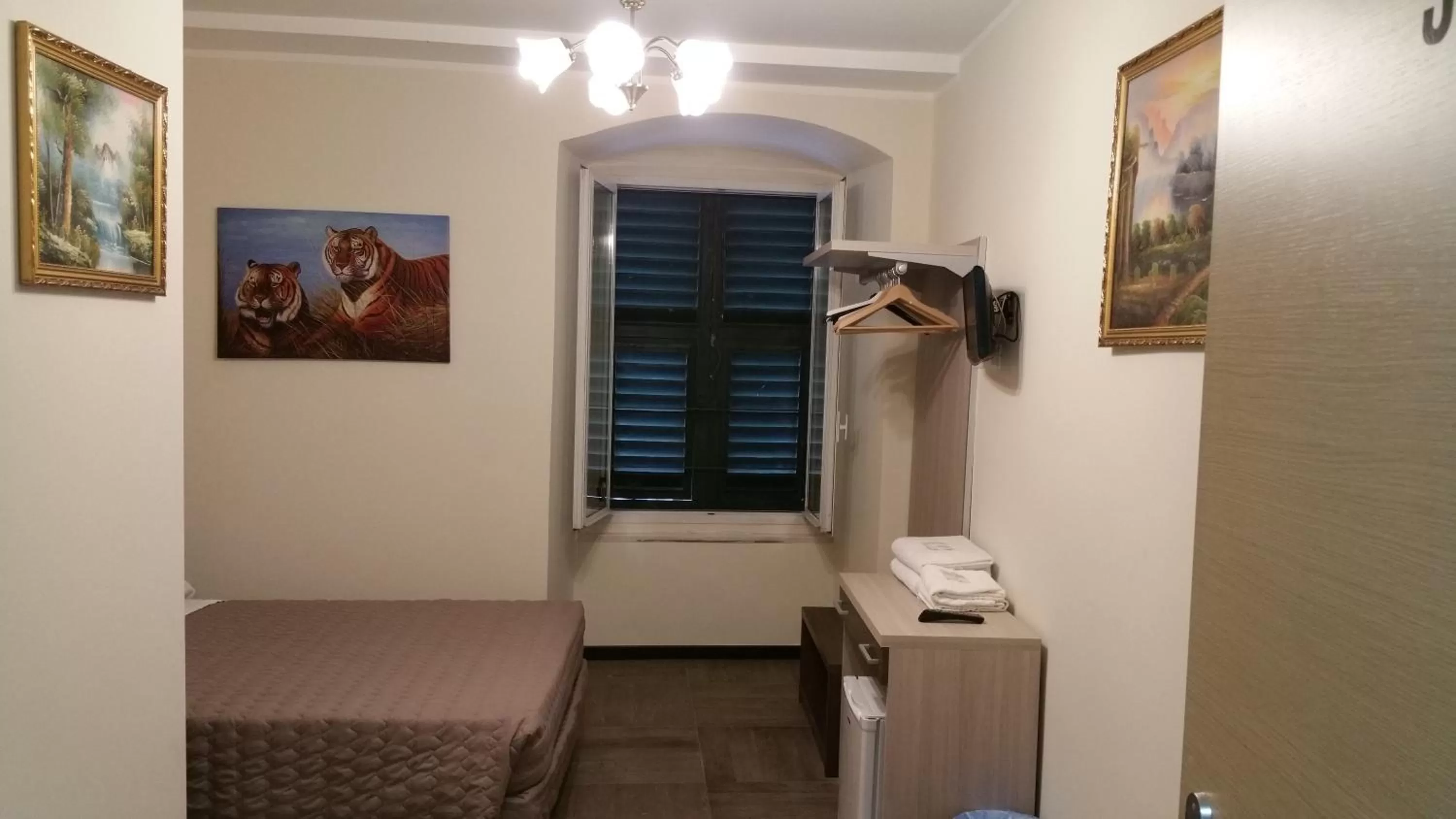 Bed in Hotel Tommaseo