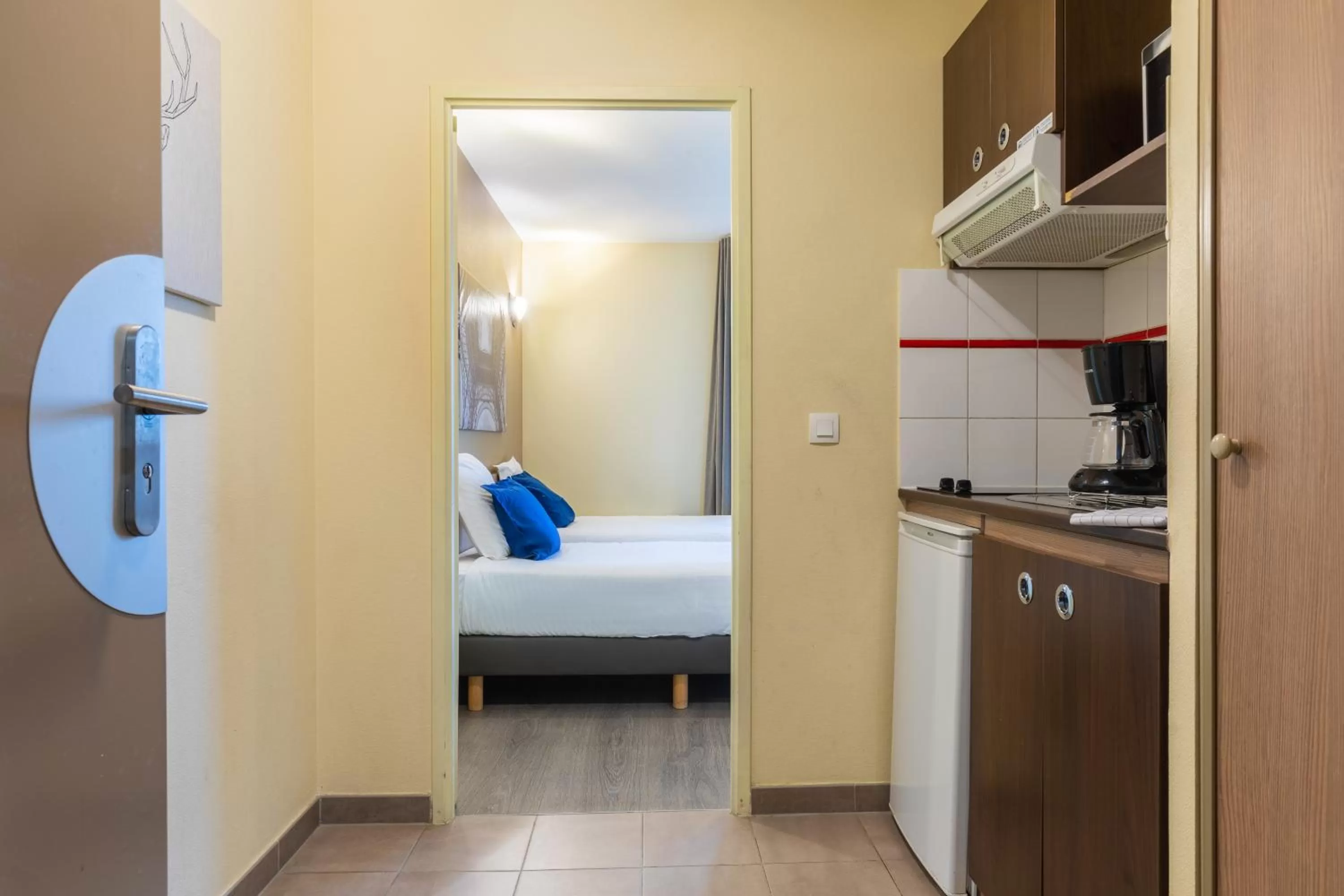 Bed in Zenitude Hôtel-Résidences Magny-les-Hameaux