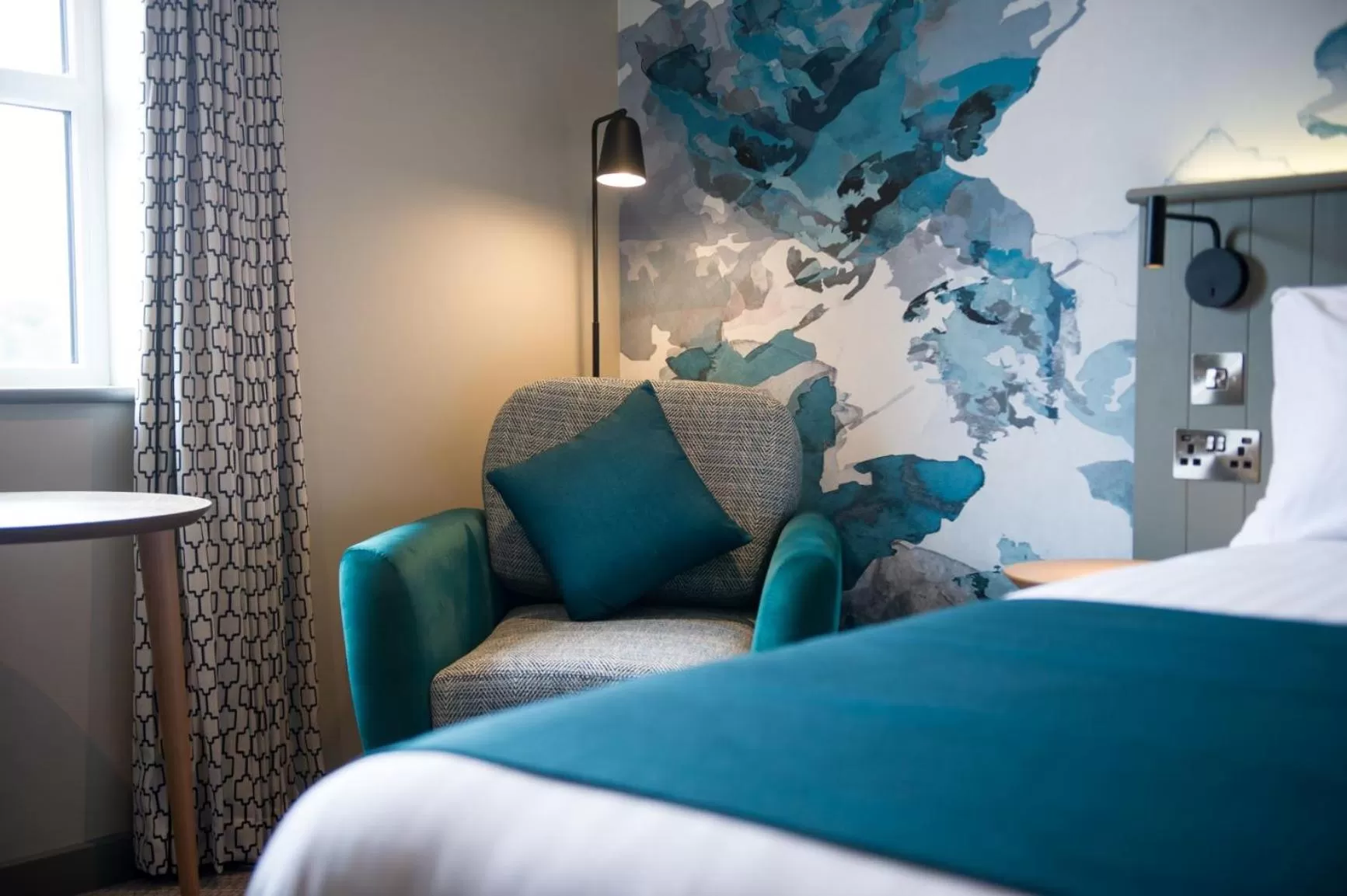 Bed, Seating Area in The Melville Inn by Innkeeper's Collection