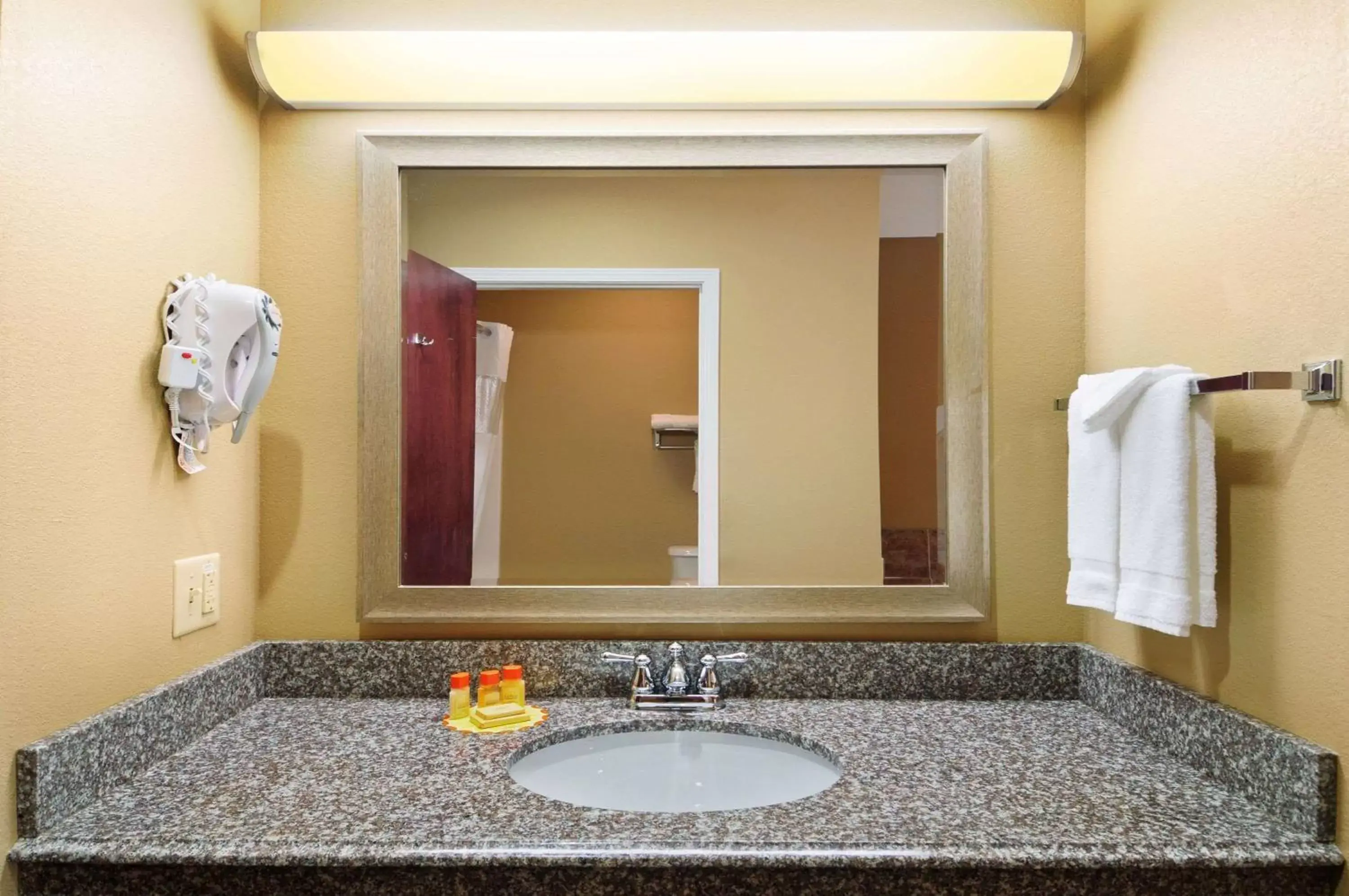 Bathroom in Days Inn & Suites by Wyndham Cabot