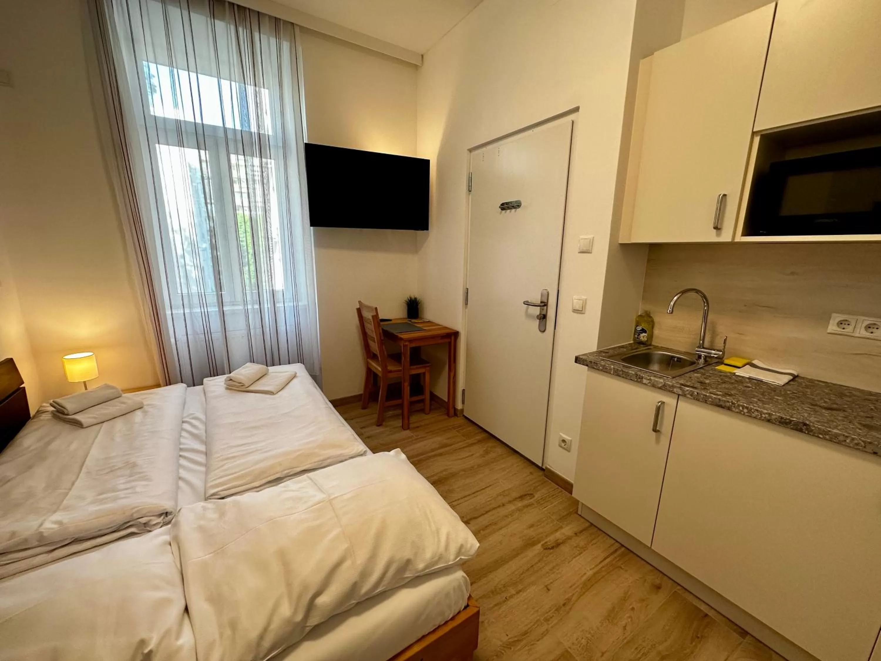 Photo of the whole room, Bed in AJO Apartments - Messe City Flat - Self-Check-in