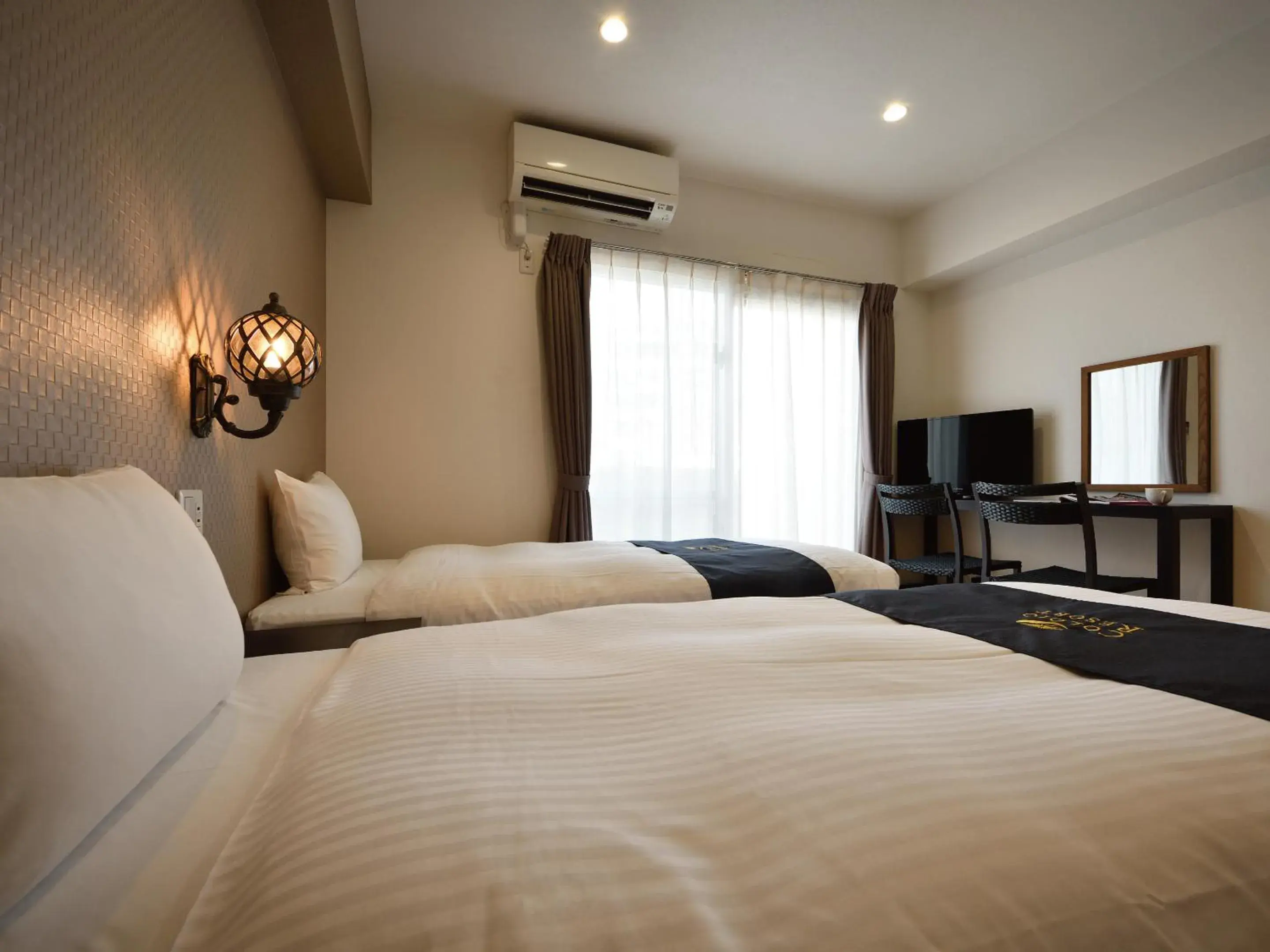 Bed in Condominium L's INN Bed in Condominium L's INN