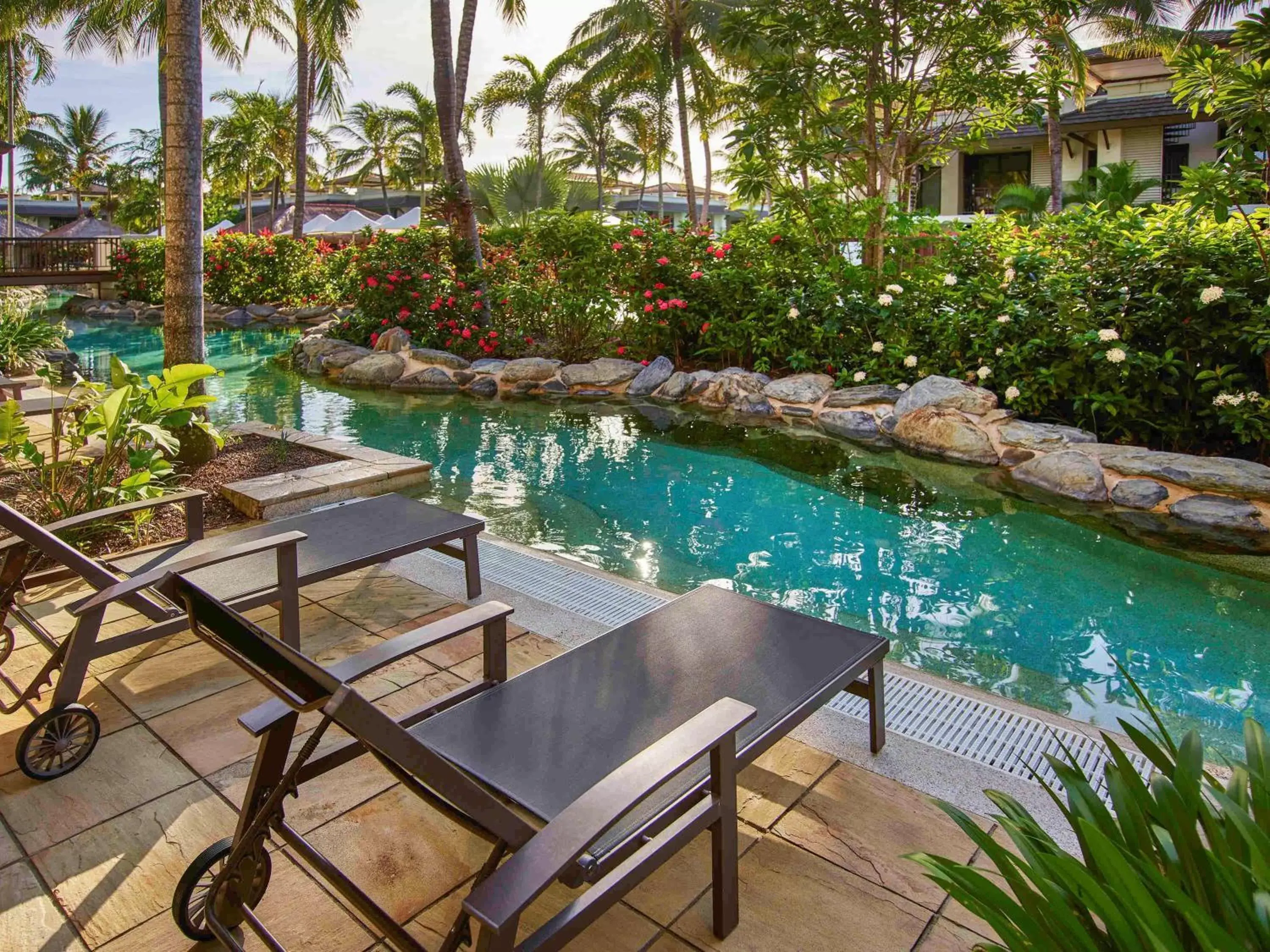 Photo of the whole room, Swimming Pool in Pullman Port Douglas Sea Temple Resort and Spa