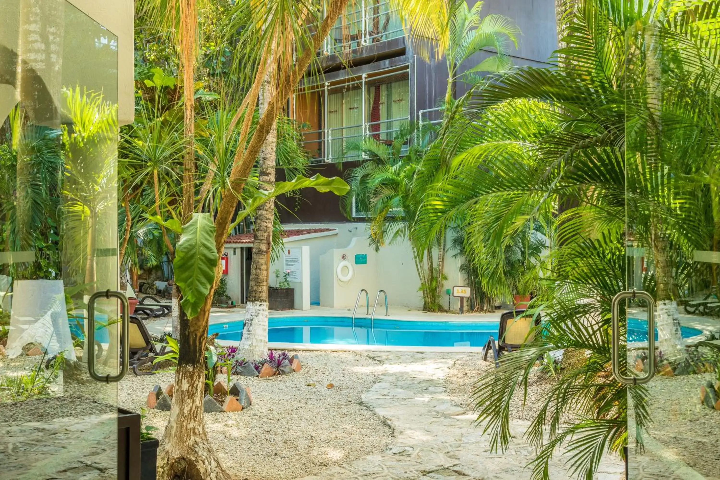 Property building, Swimming Pool in Hacienda Paradise Hotel by BFH