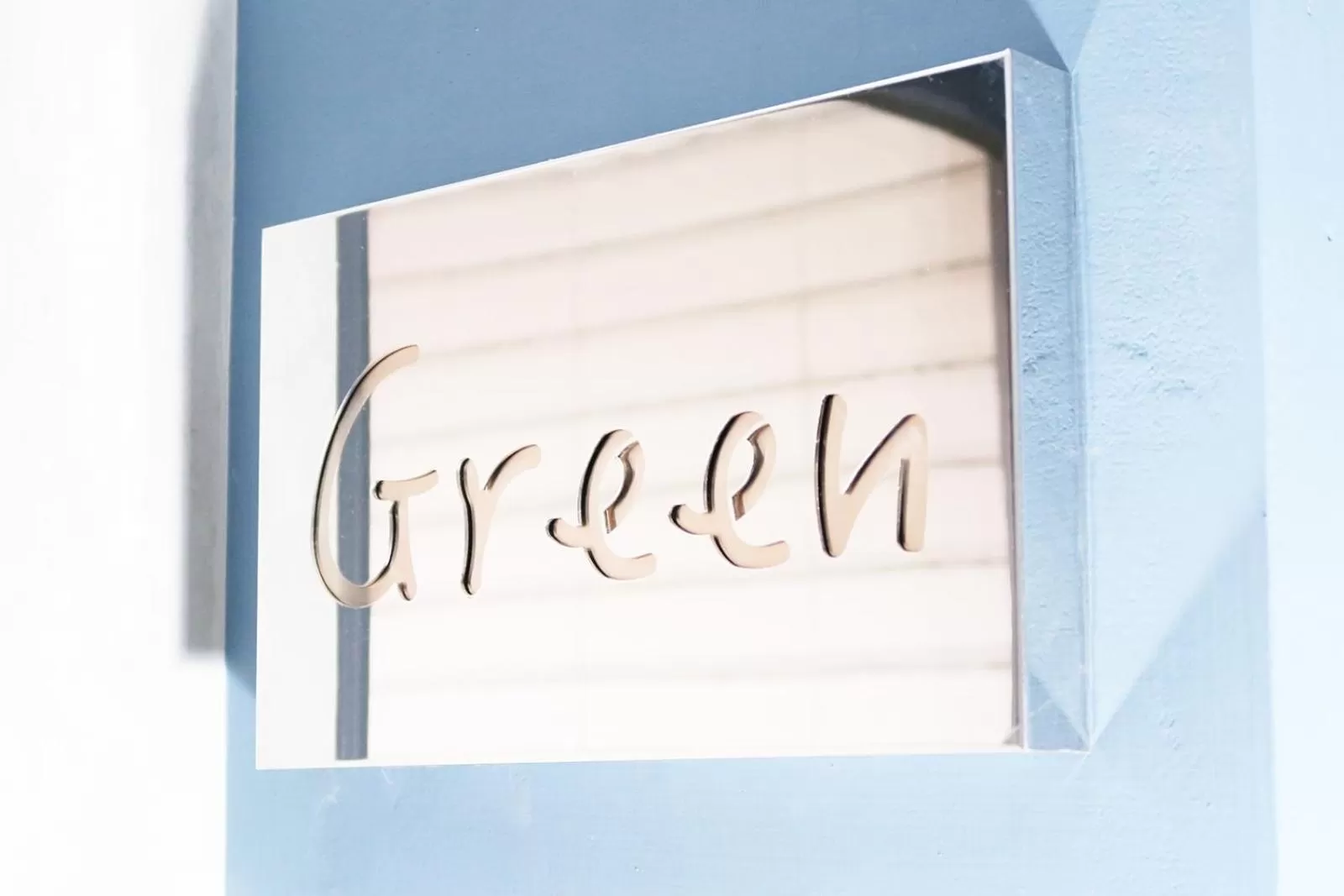 Property logo or sign in Greenight Hotel